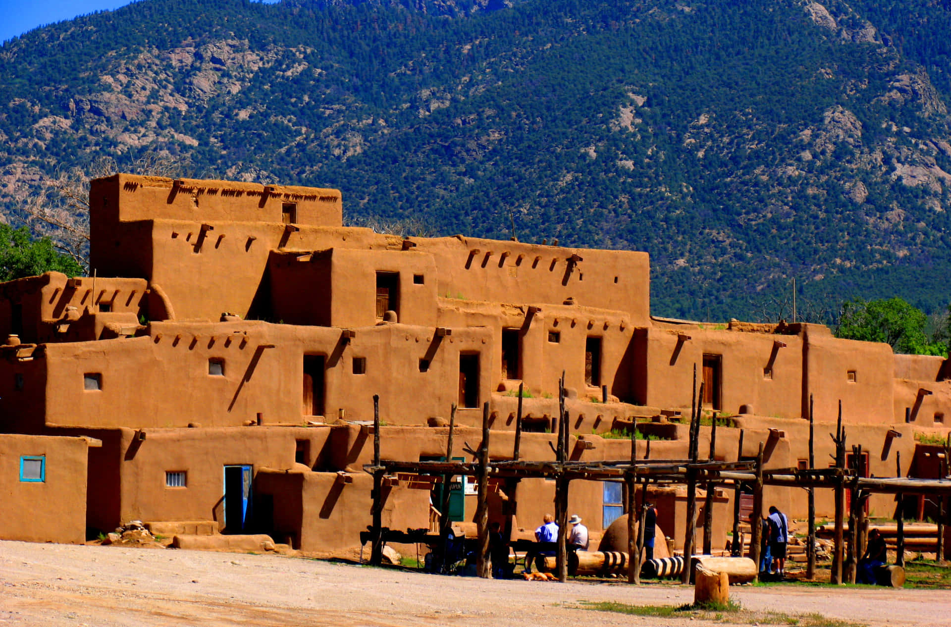 Caption: "Magnificent midday at the Historic Taos Pueblo" Wallpaper