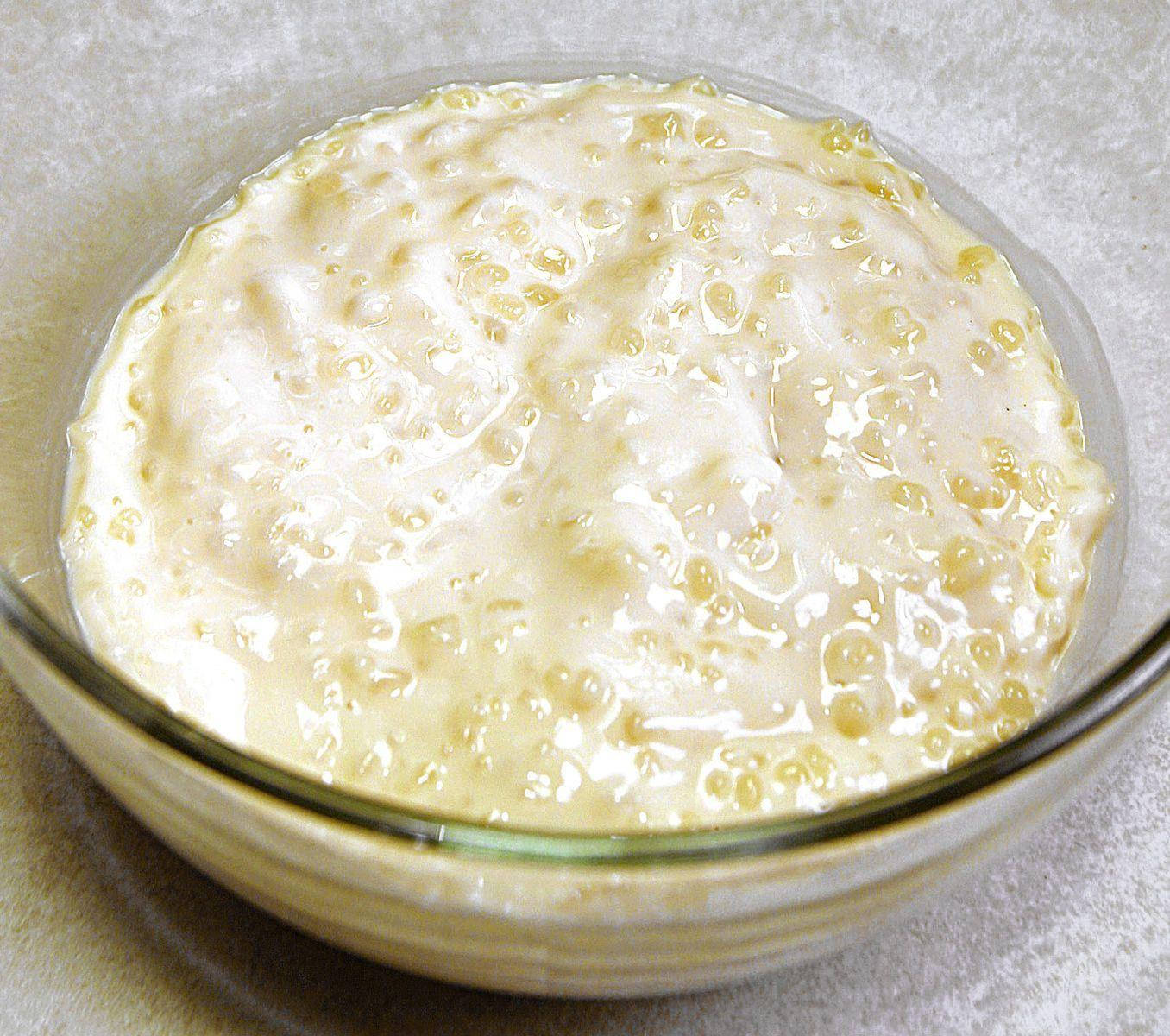 Delicious Tapioca Pudding with White Sauce Wallpaper