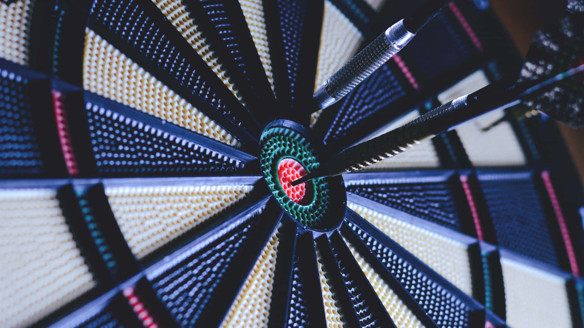 A Dart Is In The Center Of A Dart Board
