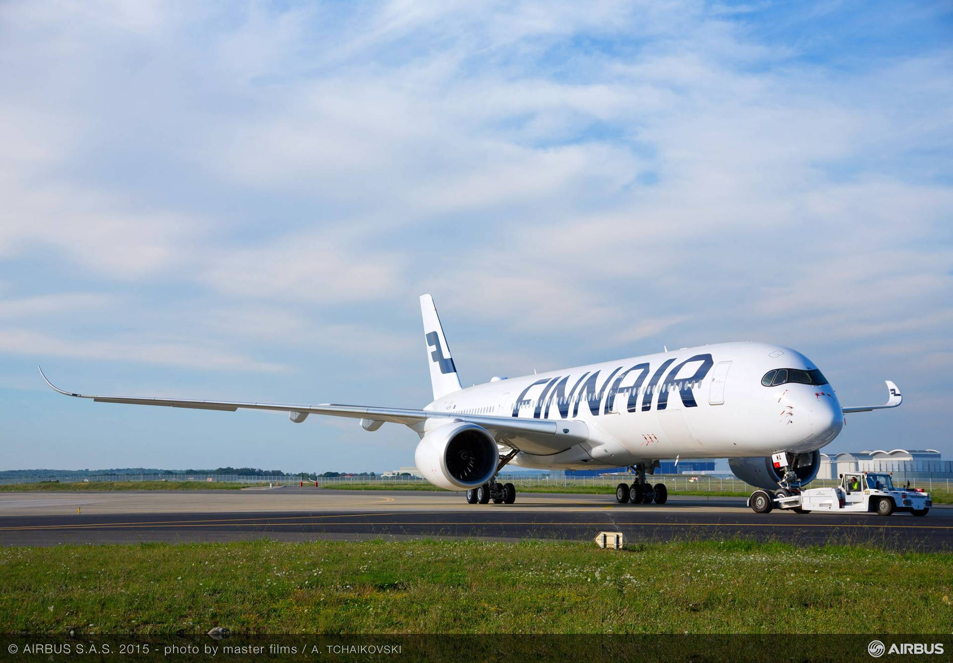 Finnair lander på en smuk himmel. Wallpaper