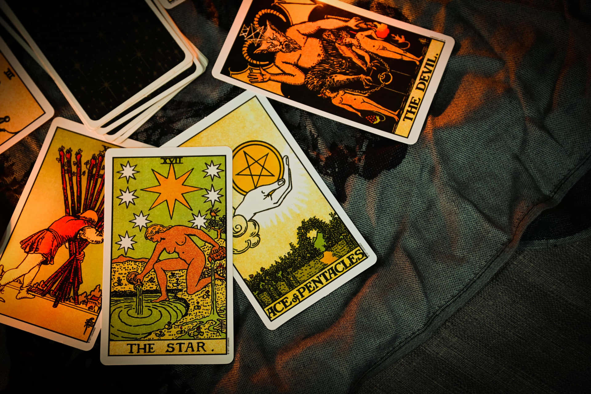 A mystical tarot card reading with a celestial backdrop
