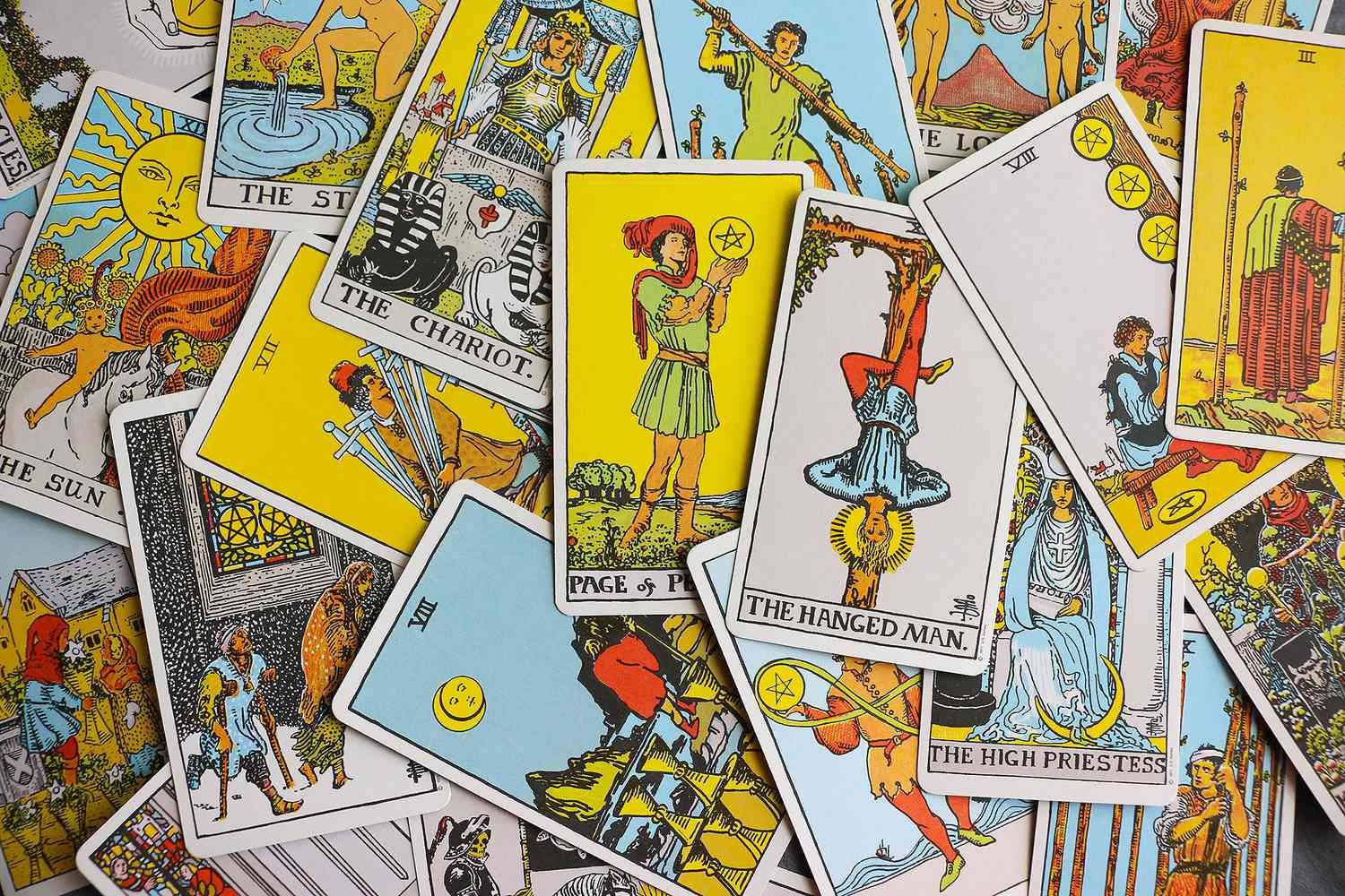 A Pile Of Tarot Cards With Many Different Images Wallpaper