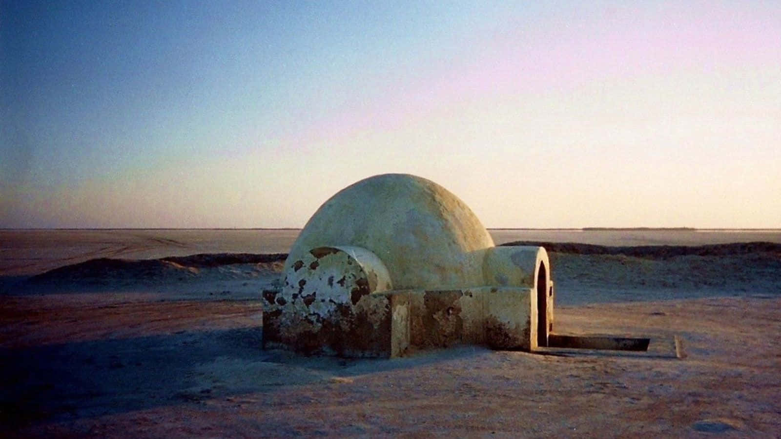 Join the adventure on Tatooine: Home to Luke Skywalker Wallpaper