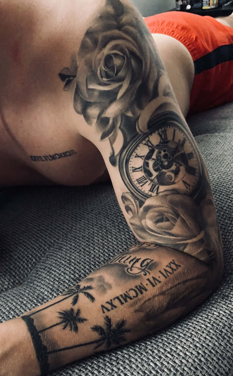 Rose And Clock Man Tattoo Arm Picture
