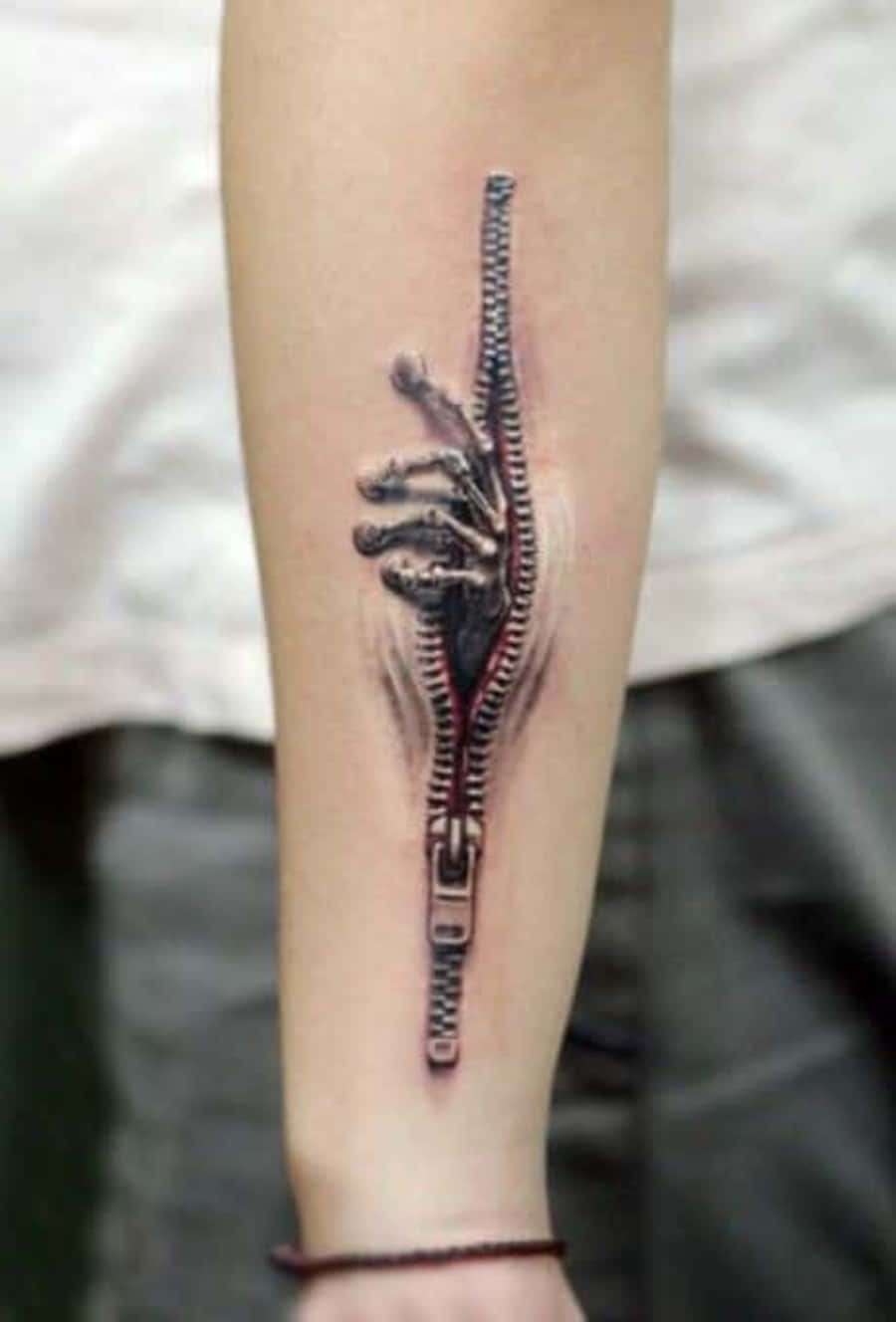 Sophisticated Artistic Arm Tattoo Design