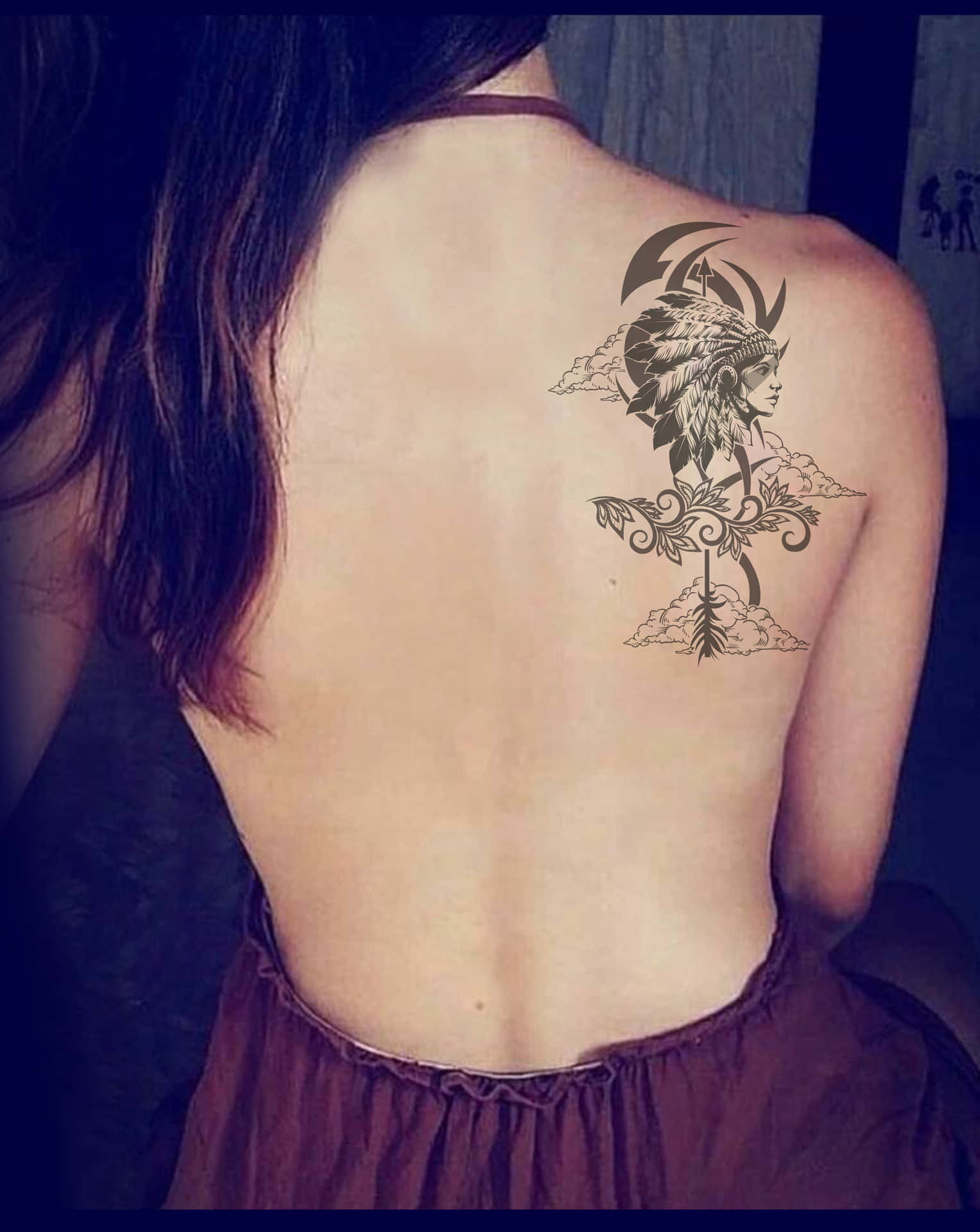 "Beautiful tattooed woman expressing her individuality"