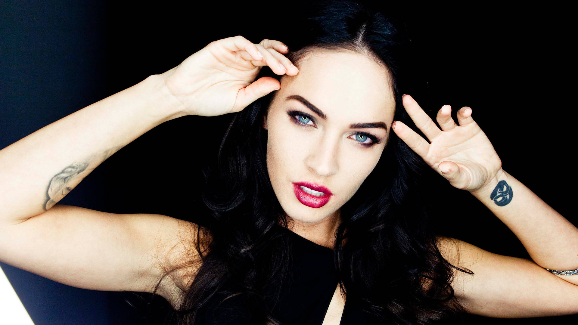 Megan Fox covered up her pelvis tattoo of her ex's name with a massive  snake | Glamour UK