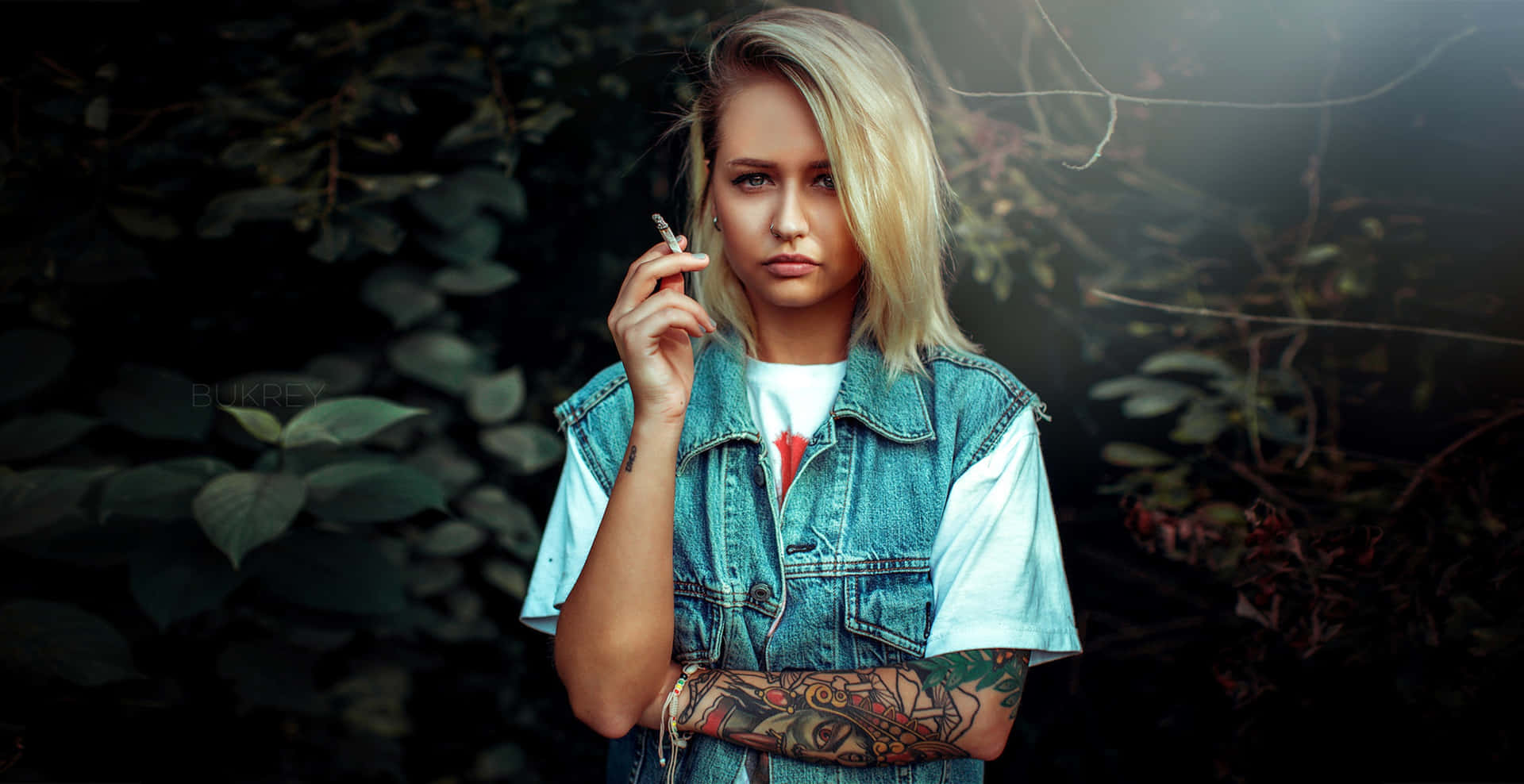 Download Tattooed Blonde Girl Smoking Wallpaper 