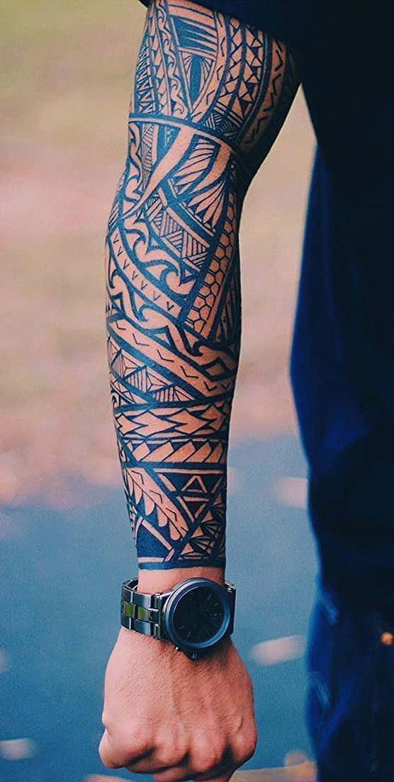Tattoos Tribal Sleeve In Black Ink Pictures