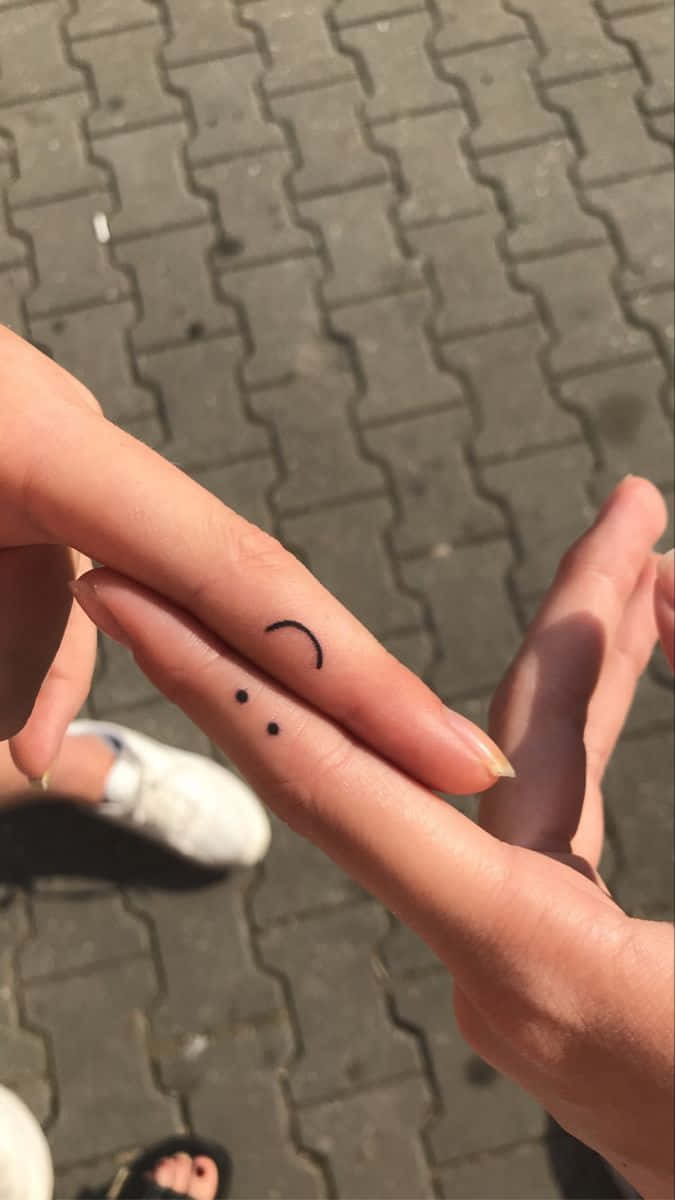 Show Off Your Fun Side With These Smiley Tattoos