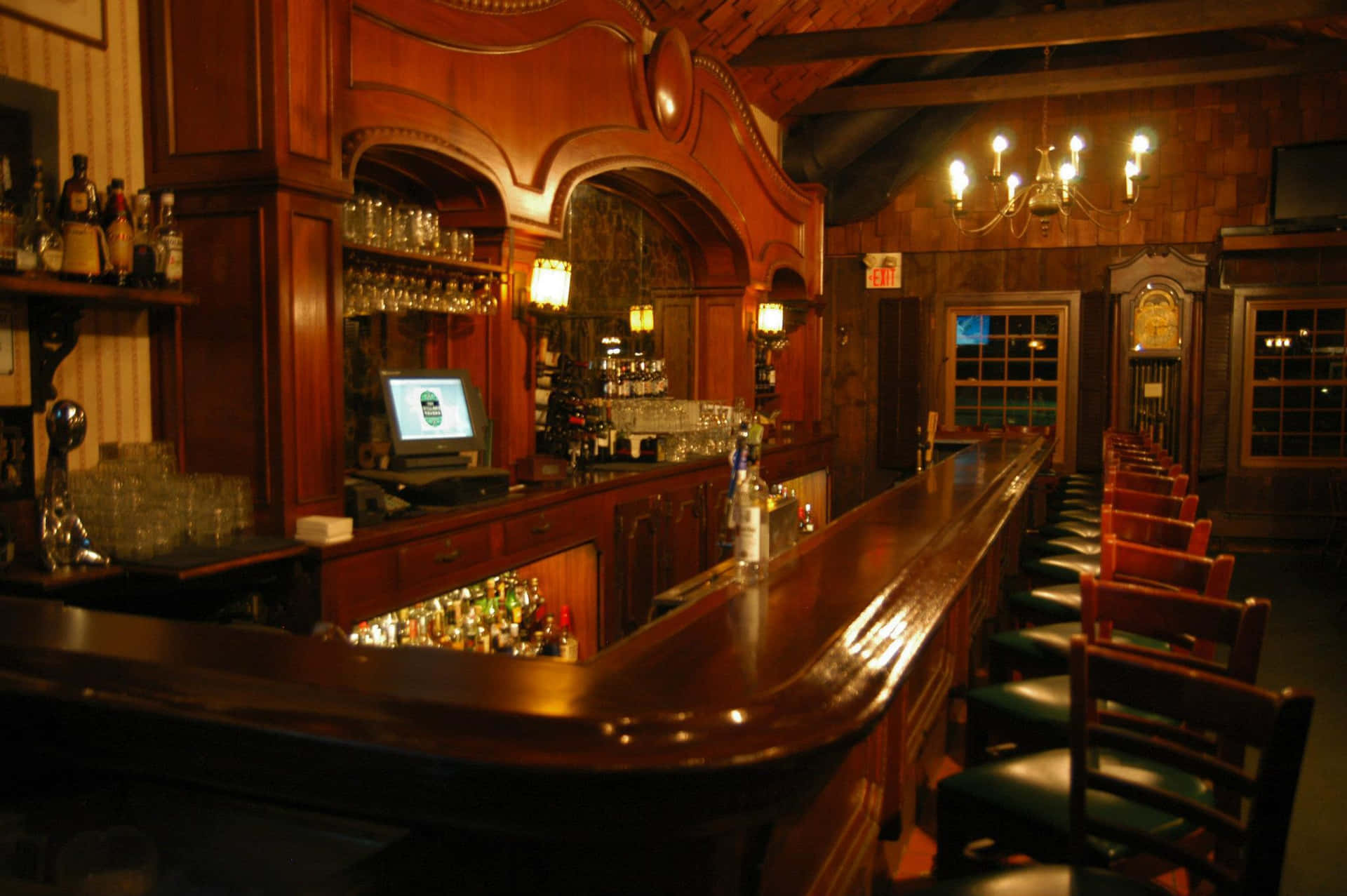 A Bar With A Long Wooden Bar