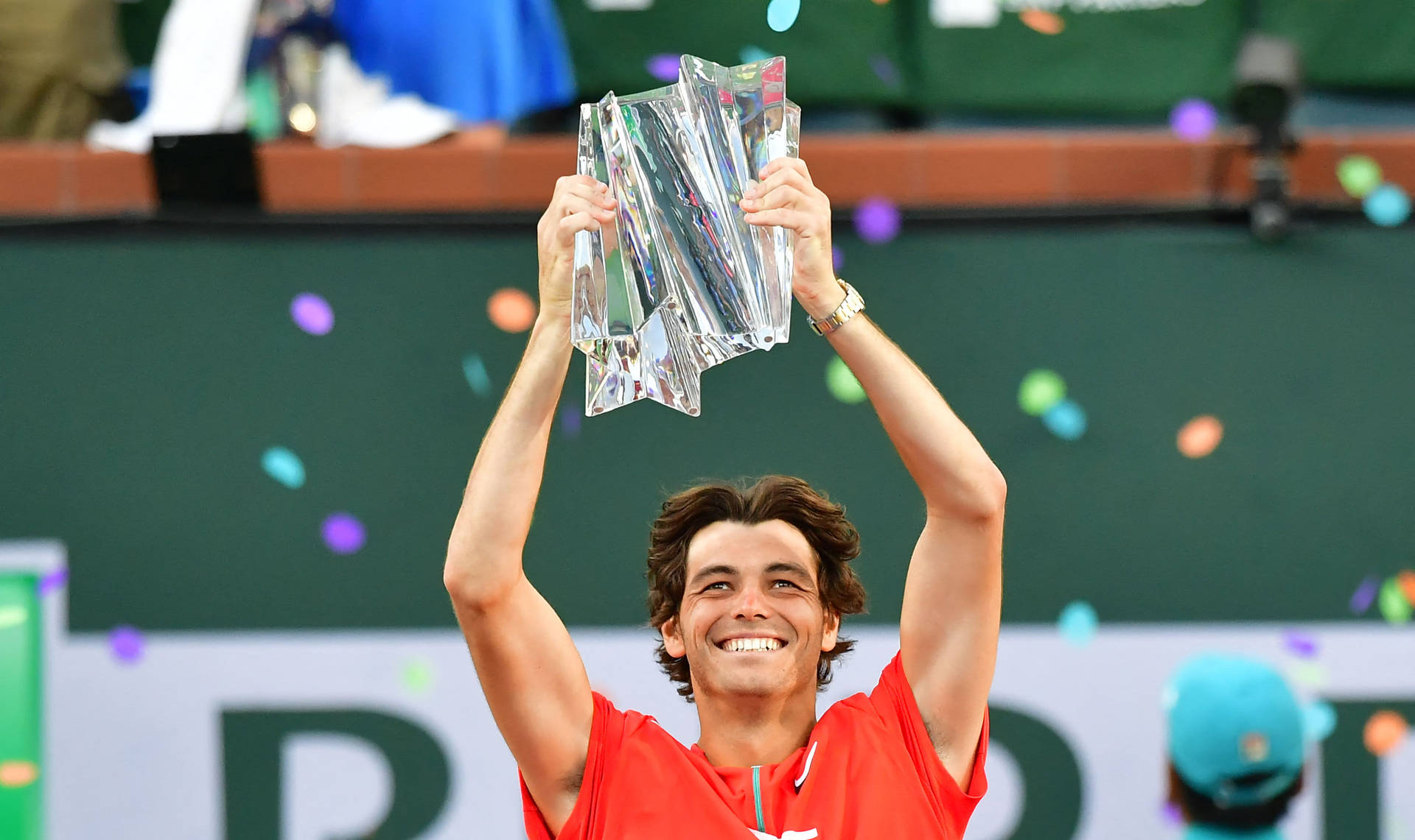 Taylor Fritz Holding A Trophy Wallpaper