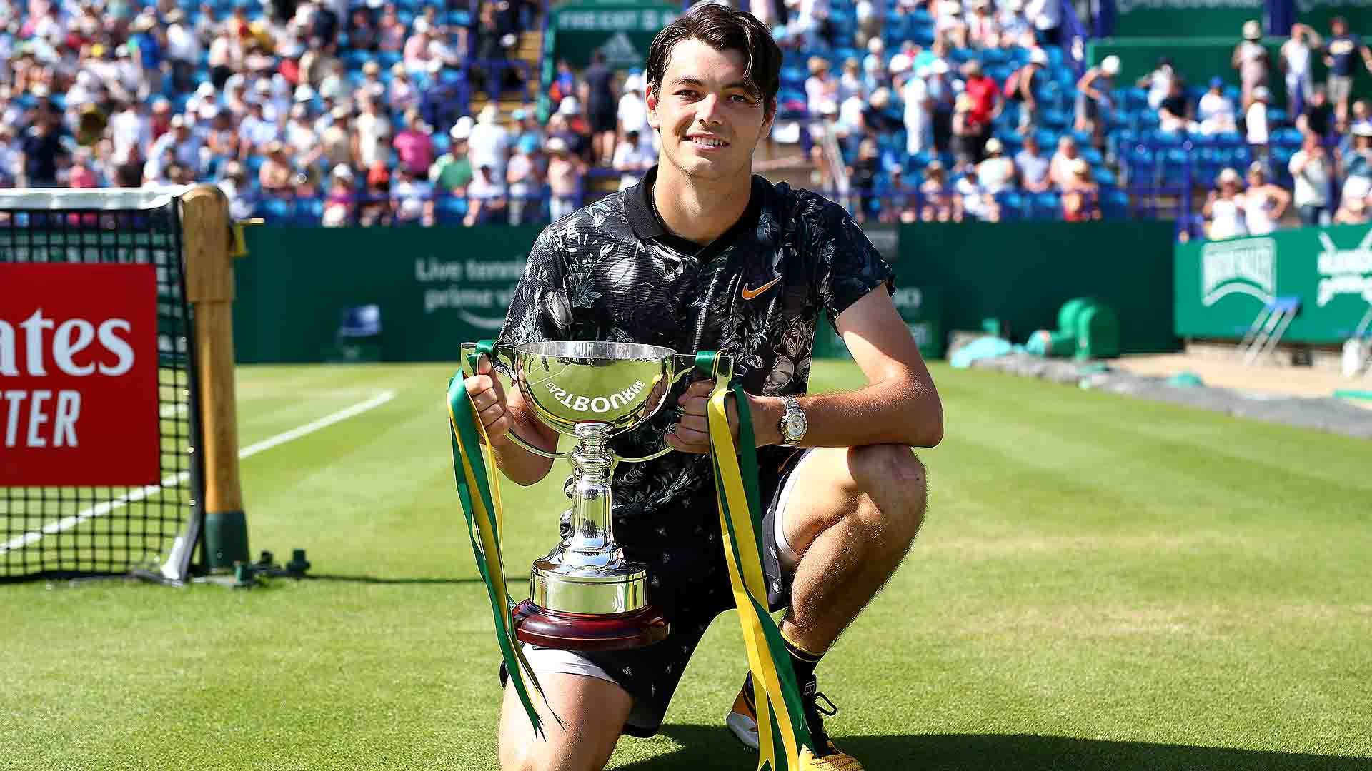 Taylor Fritz Holding His Trophy Wallpaper