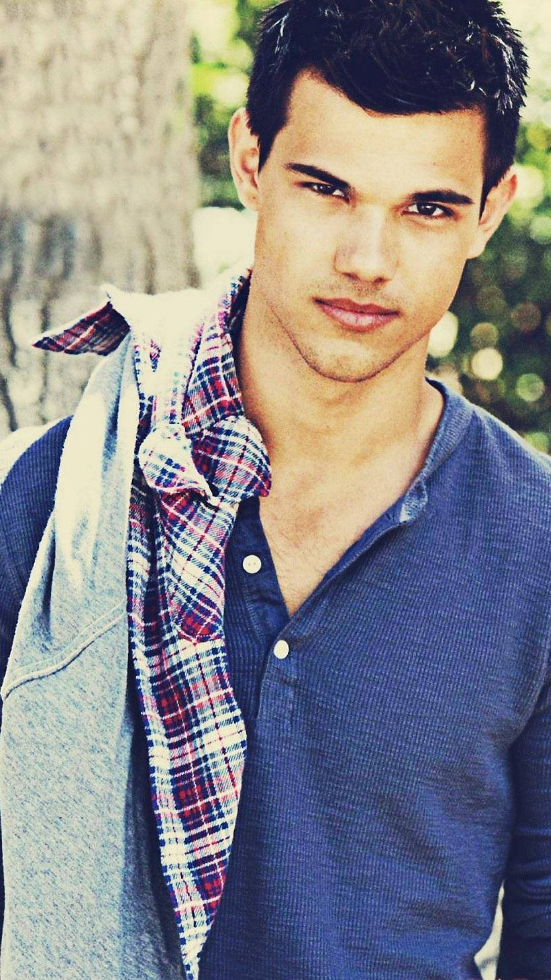 Taylor Lautner Modeling Outside Wallpaper