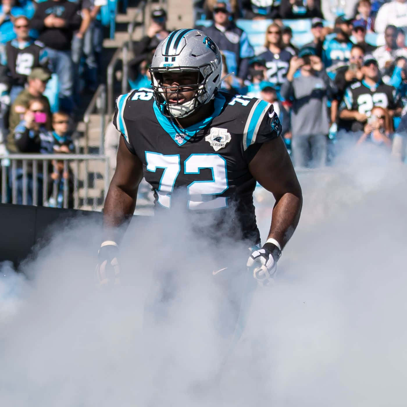 Taylor Moton Against Tennessee Titans With Smoke Effects Wallpaper