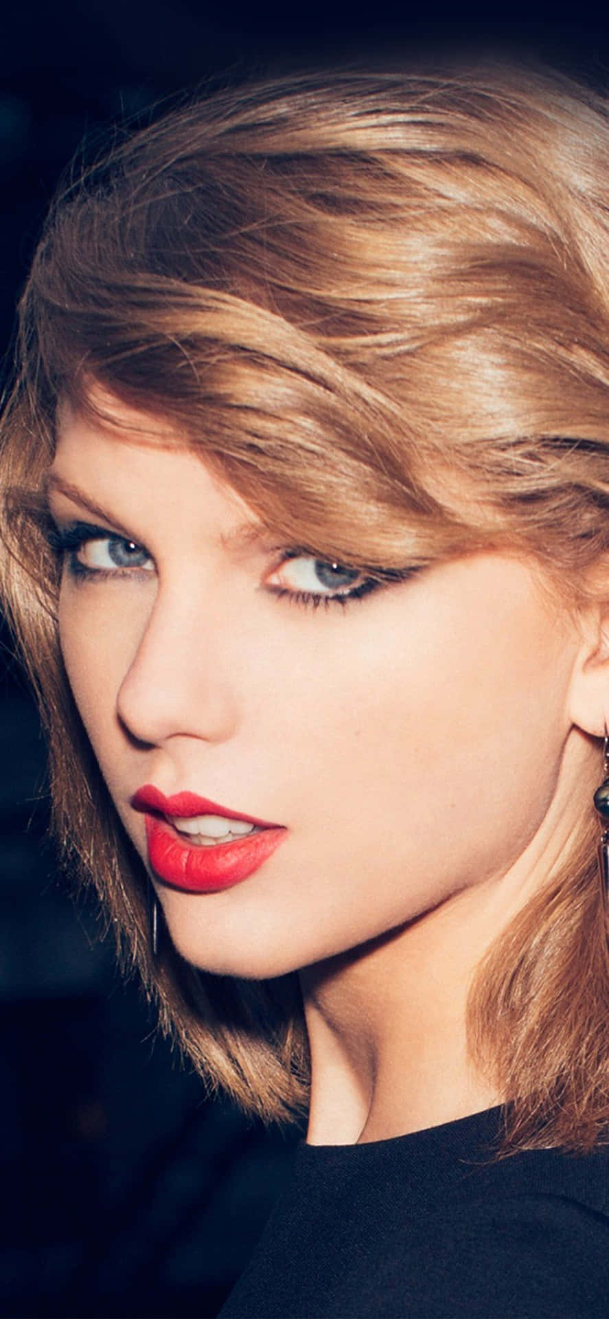 Wallpaper!gör Dig Redo Att Rocka Loss Med Taylor Swifts Officiella Iphone-bakgrundsbild! Wallpaper