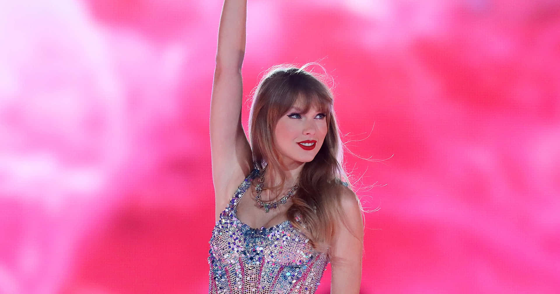 Taylor Swift Pink Backdrop Performance Wallpaper