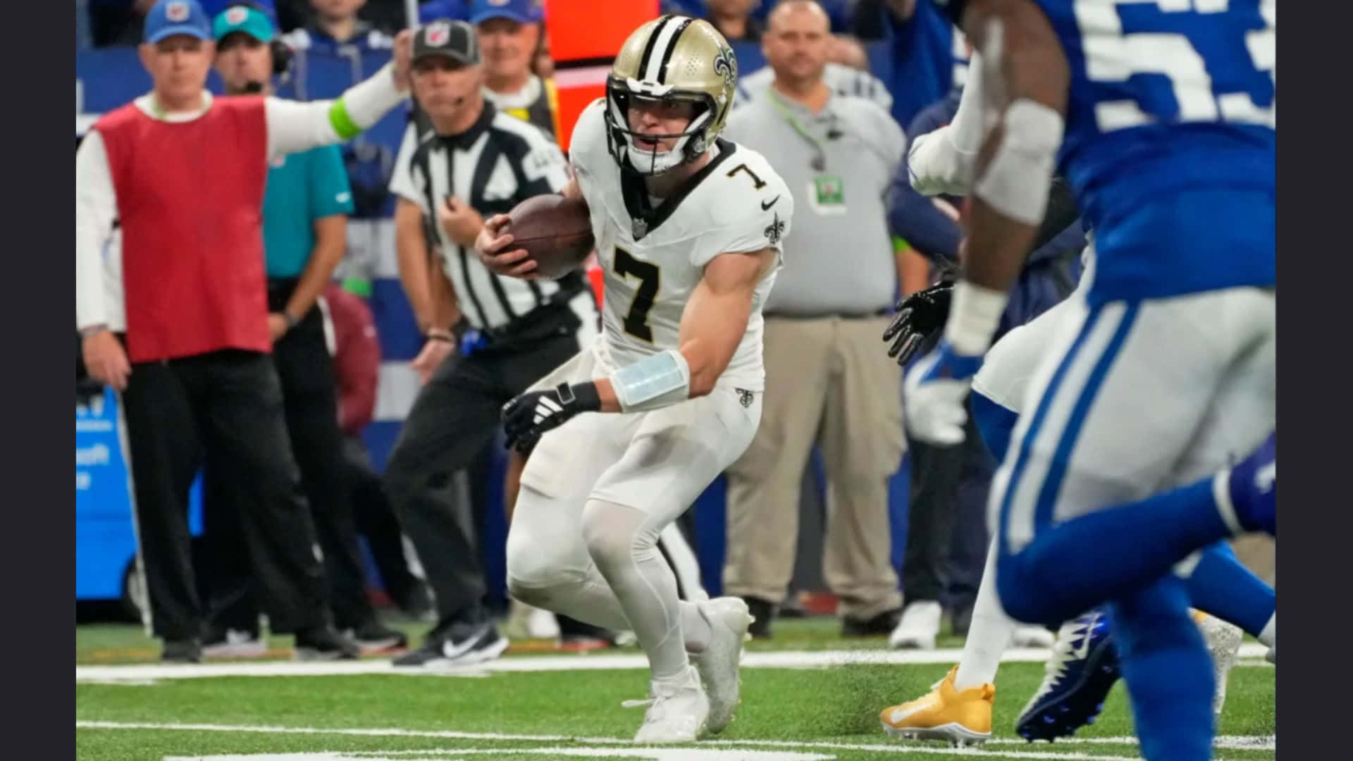 Taysom Hill In Action During Game Wallpaper