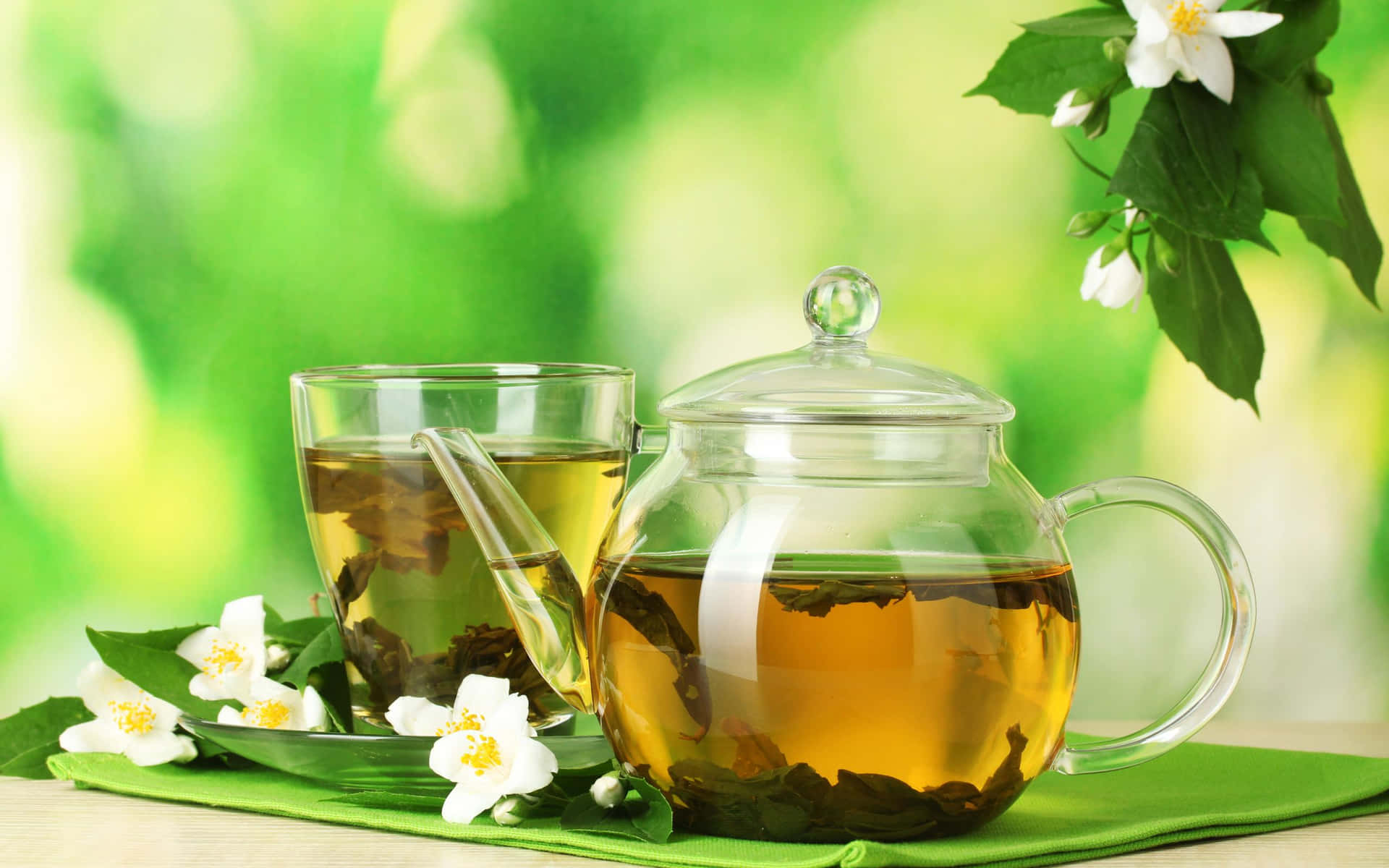 Green Tea With Flowers And Leaves
