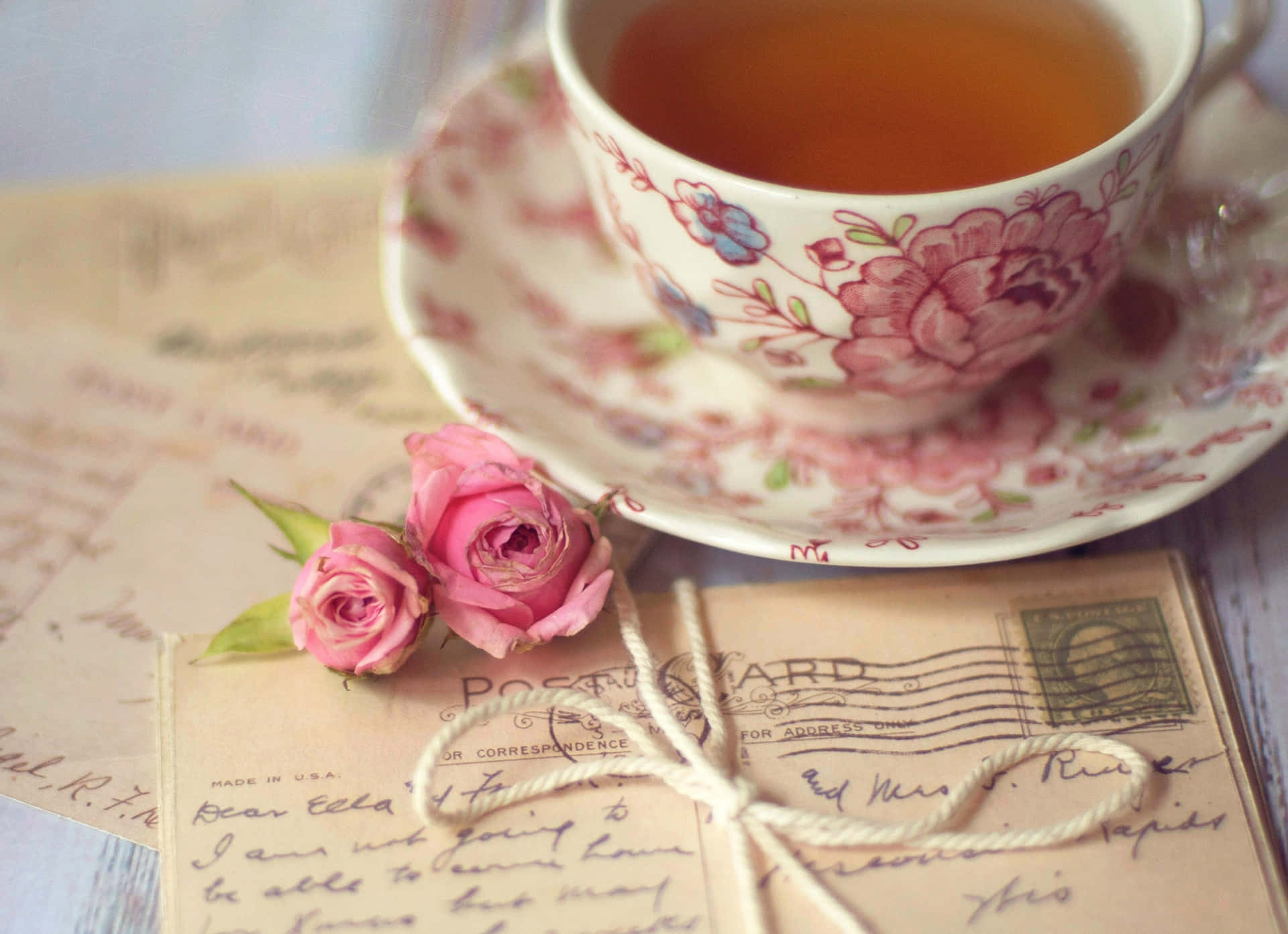 Tea Cup And Letters Picture