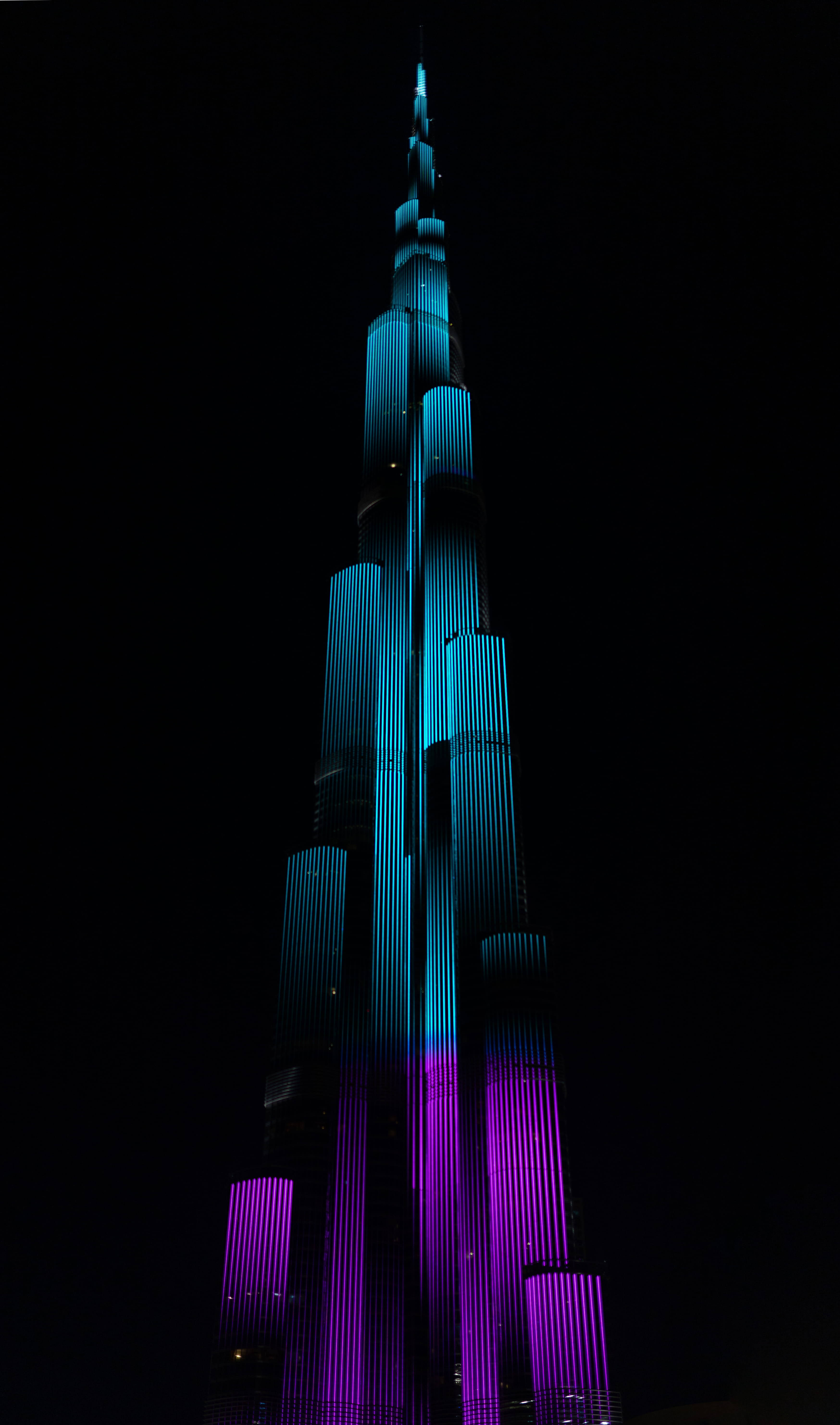Teal And Violet Colors On Burj Khalifa Wallpaper
