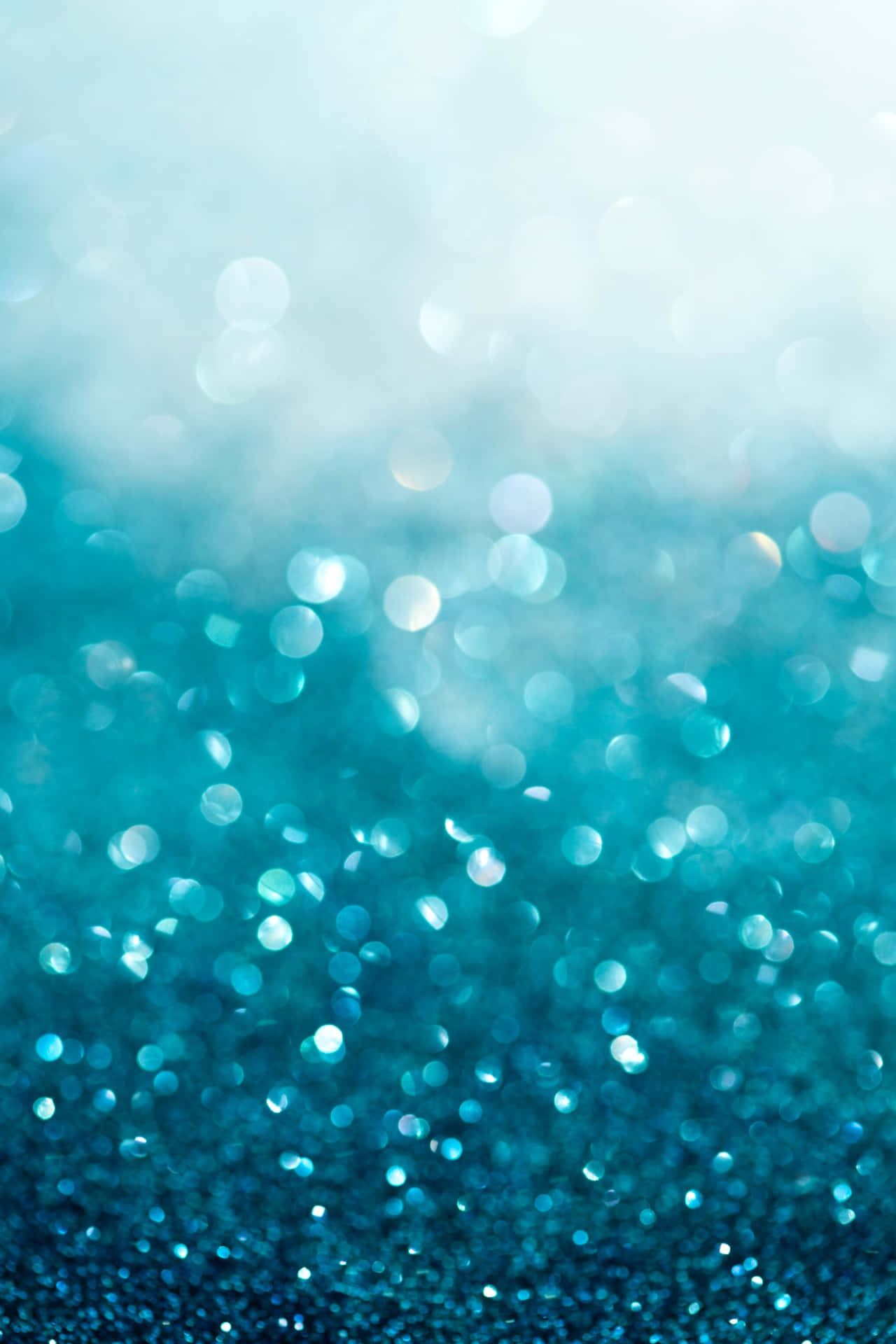 "A sparkly teal glitter background, perfect for adding a shimmering touch to your device or project."