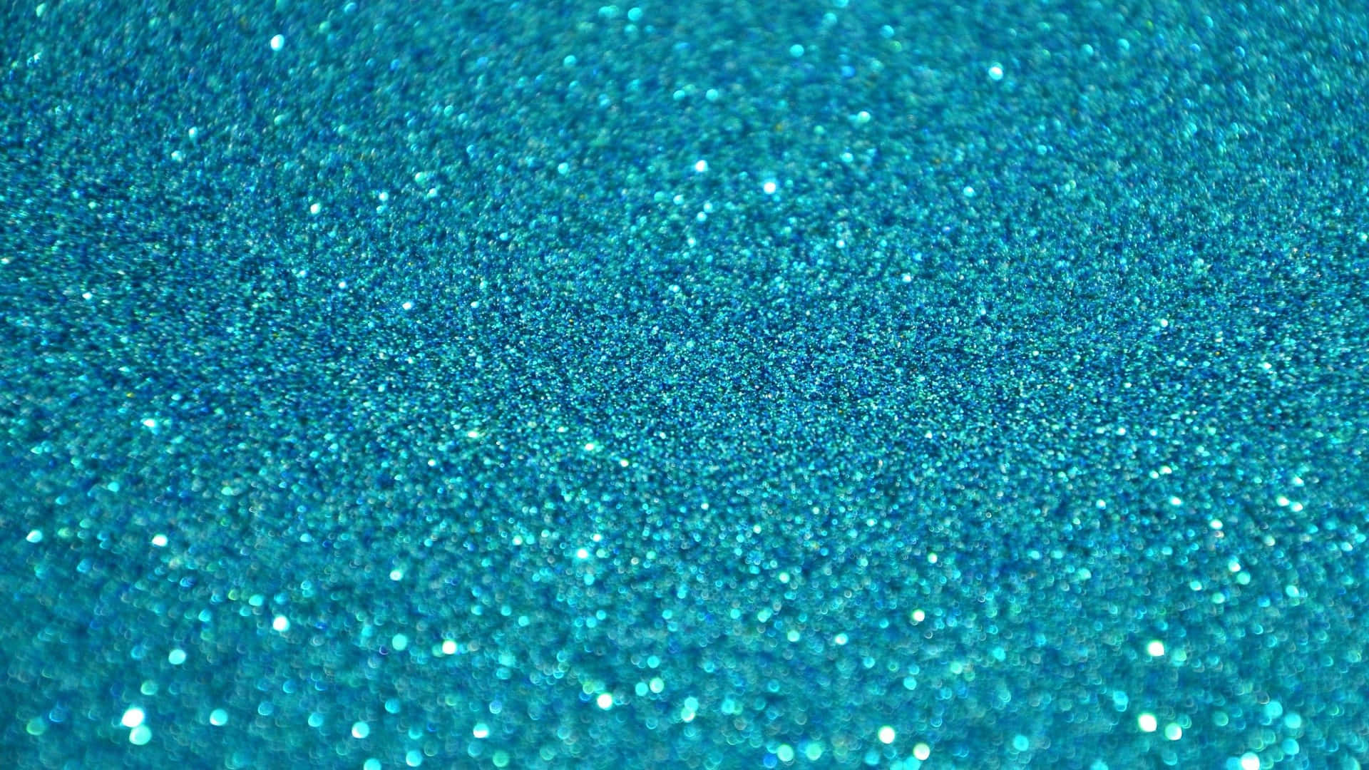 Shine Brightly with this Teal Glitter Background