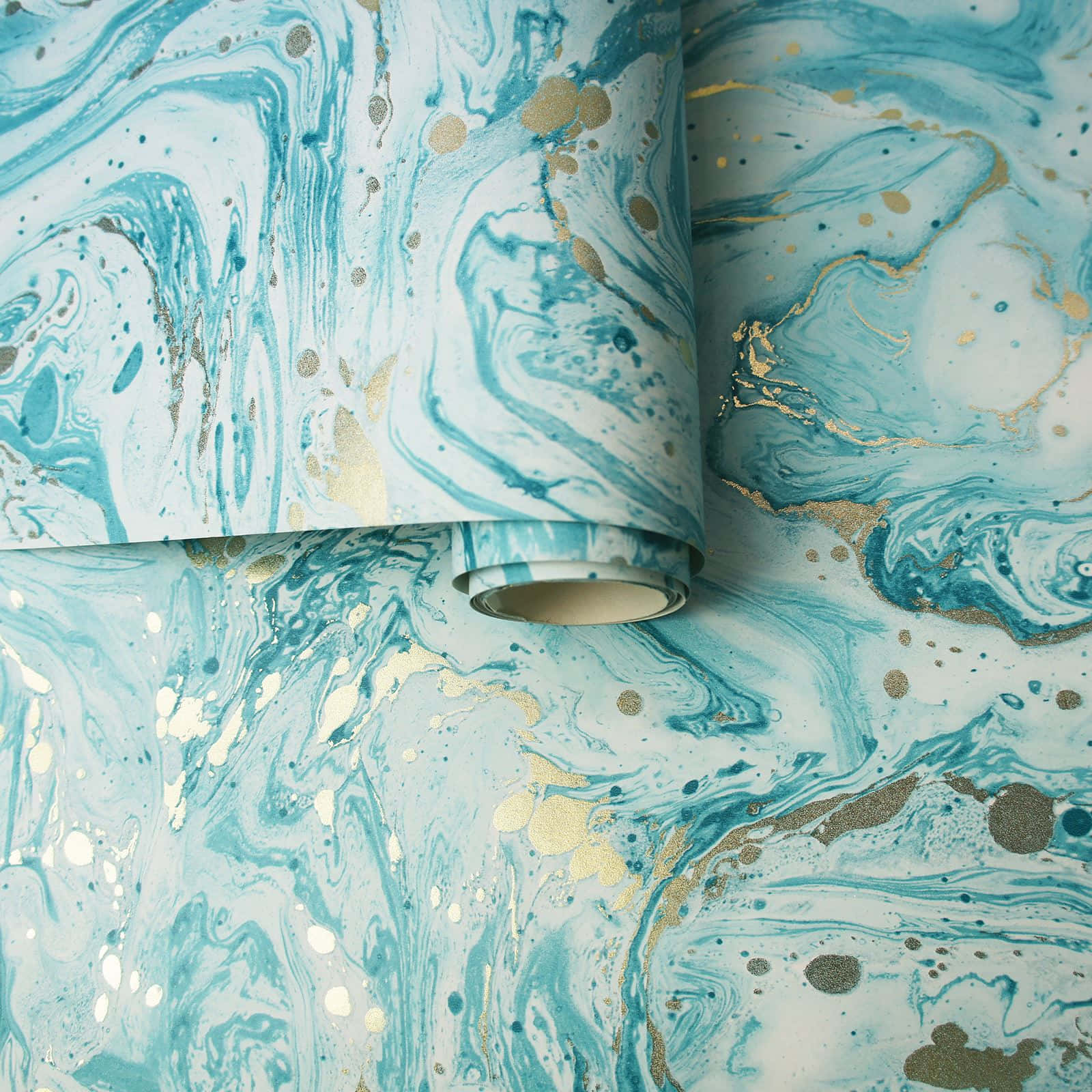A Roll Of Wallpaper With A Blue And Gold Marble Pattern Wallpaper