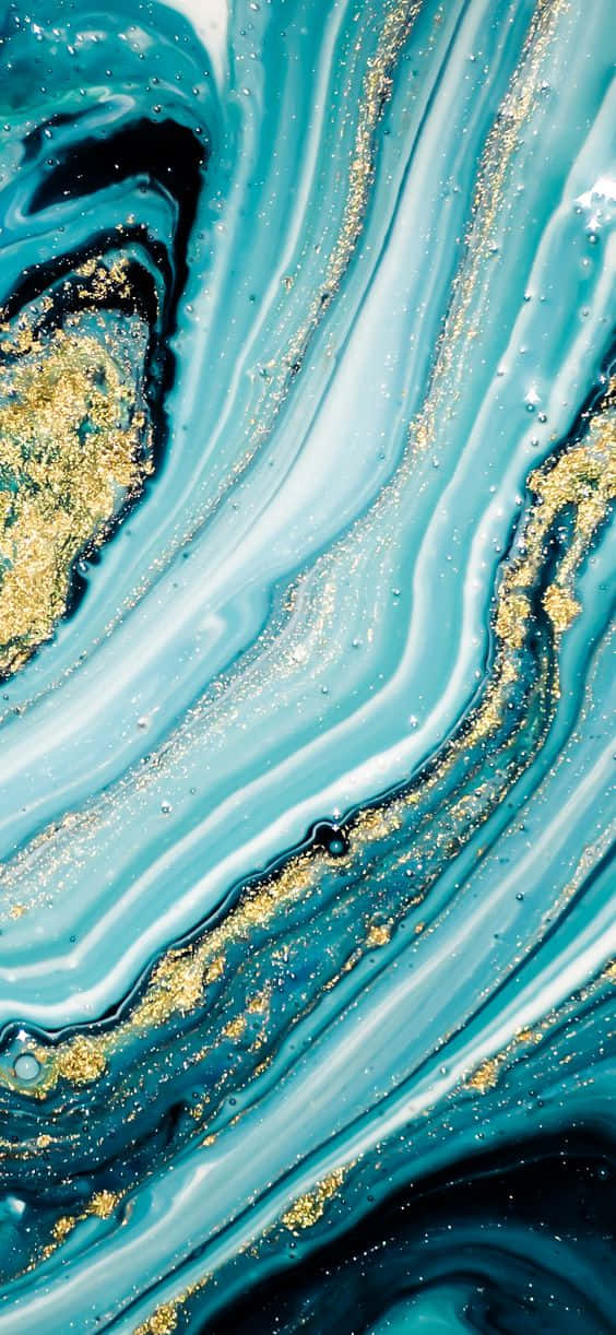 A Blue And Gold Swirled Marble Painting Wallpaper