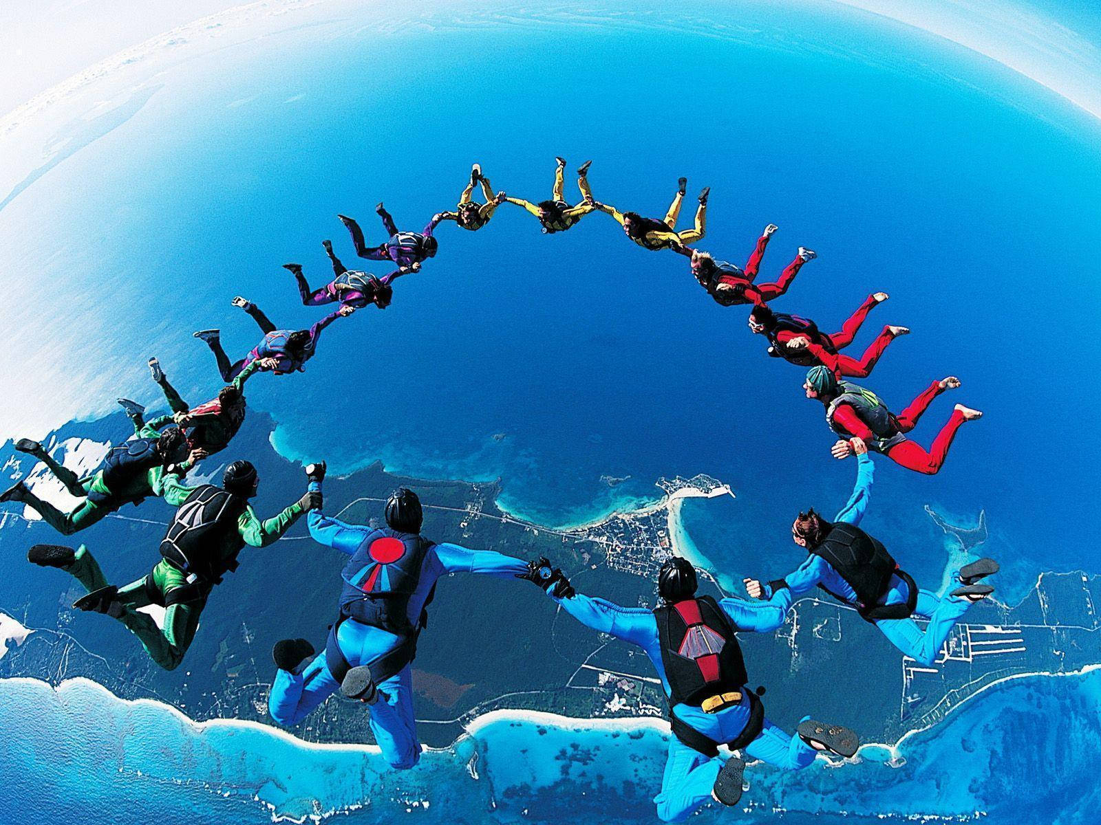 Teamwork Skydiving As A Group Wallpaper