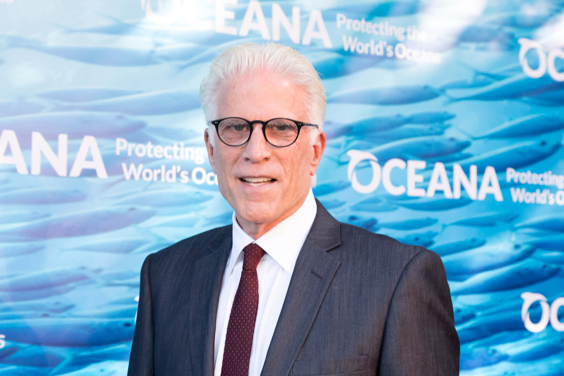 Actor Ted Danson looking pensive on the beach" Wallpaper