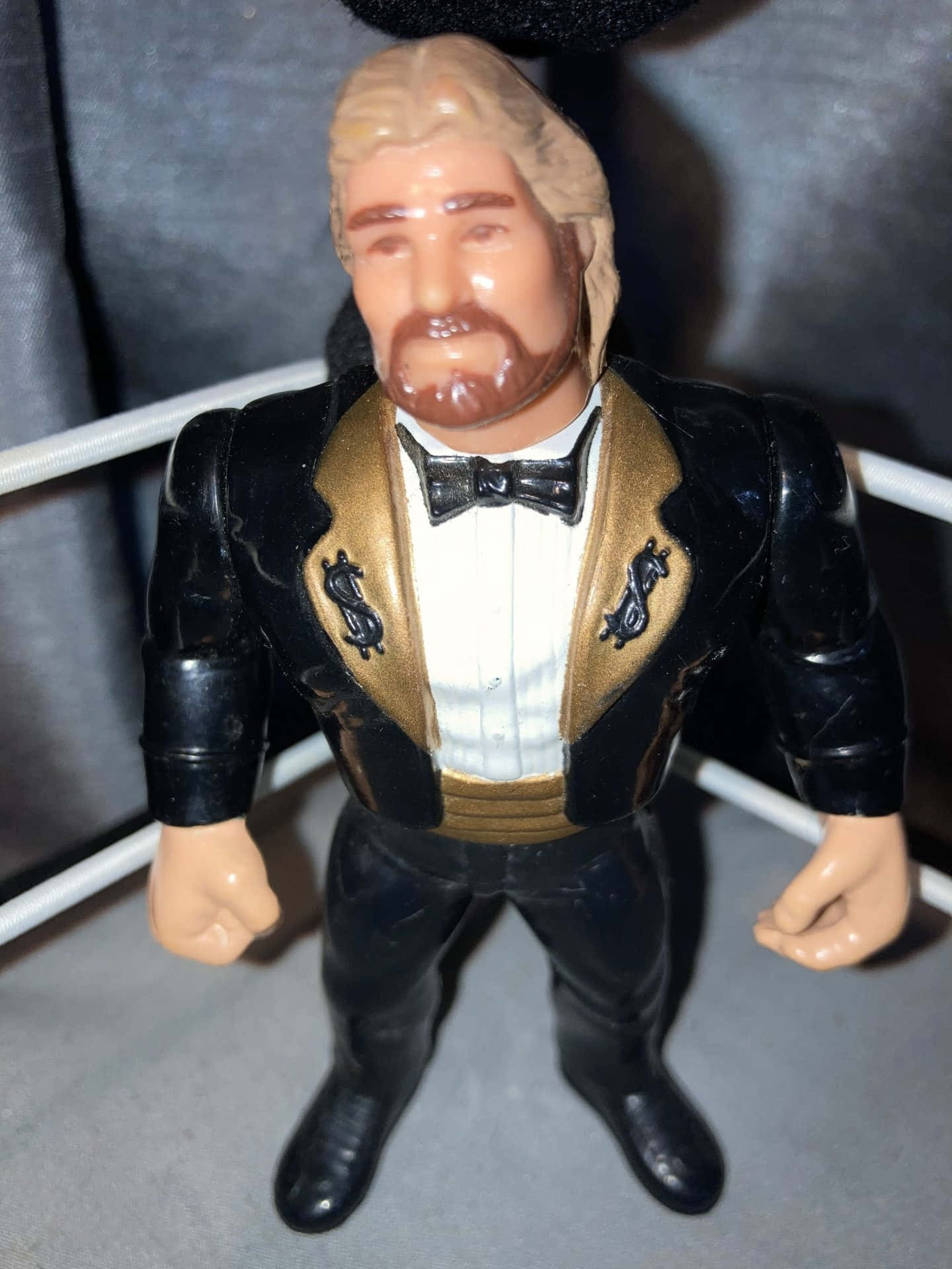 Ted Dibiase Action Figure In Dynamic Pose Wallpaper