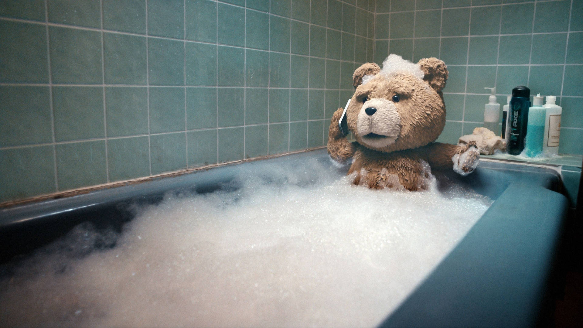 Ted soaking in a hot bath filled with bubbles Wallpaper