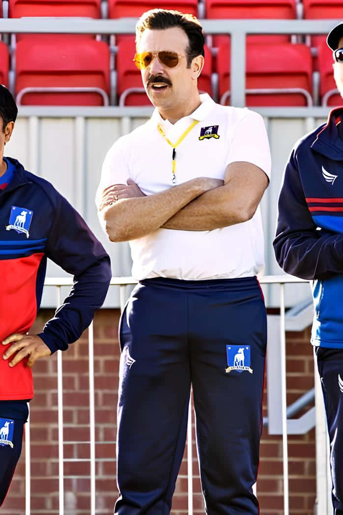 Ted Lasso Coaching Team Outdoors Wallpaper
