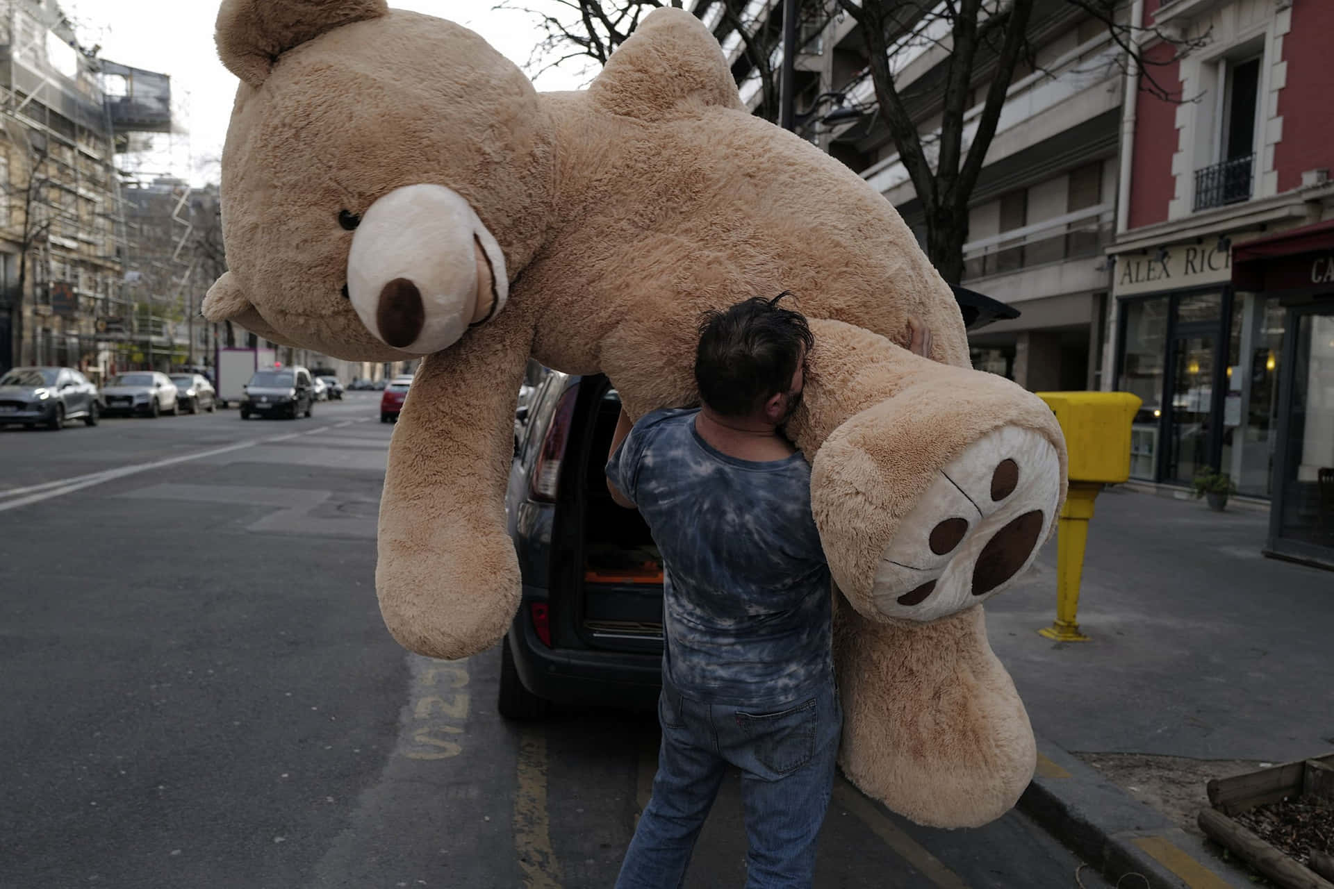 "A Smiling Teddy Bear with a Hug"