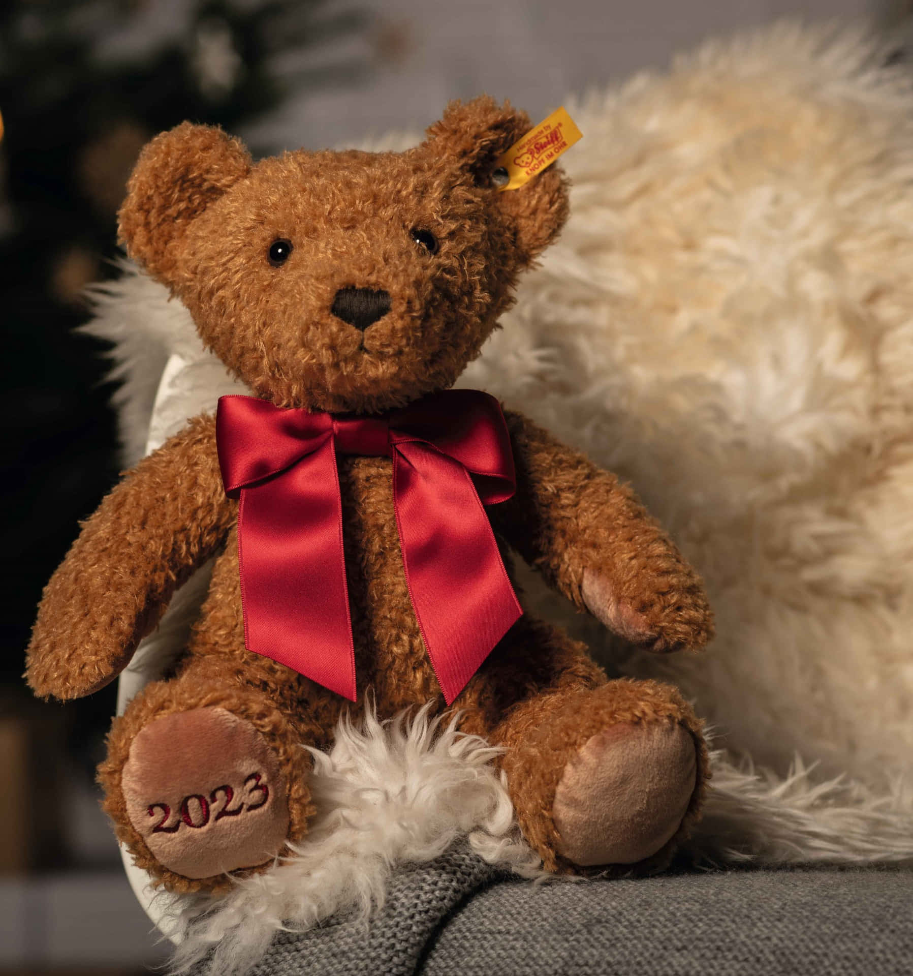 A Teddy Bear With A Red Bow
