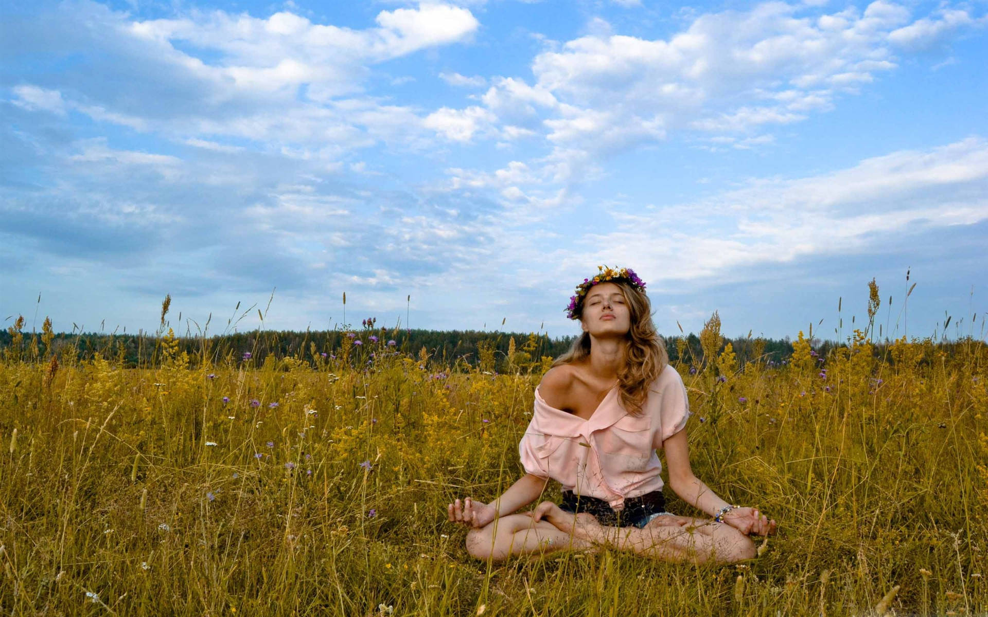 Teen girl embracing tranquility through yoga meditation Wallpaper