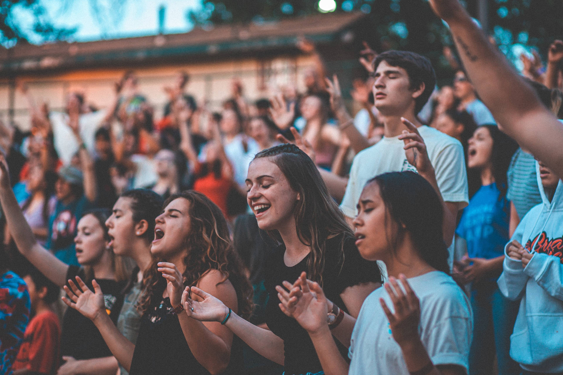 Teenage Girls In A Worship Concert Wallpaper