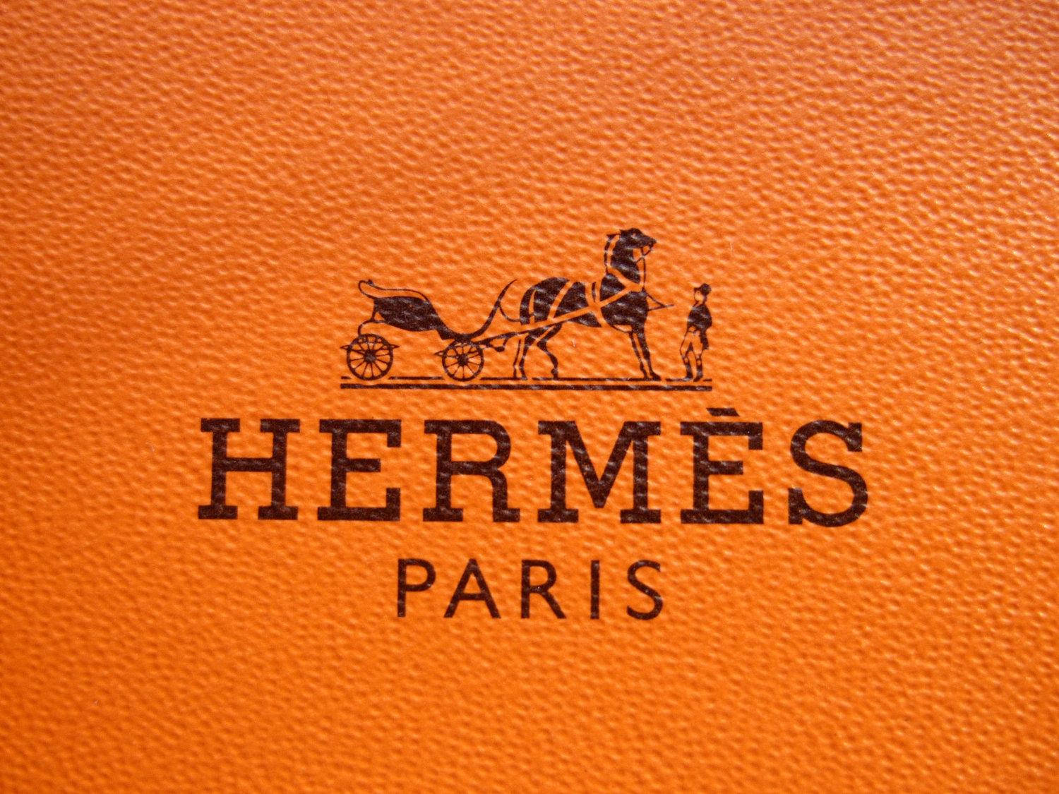 Tekstureret Orange Hermes Logo Wallpaper