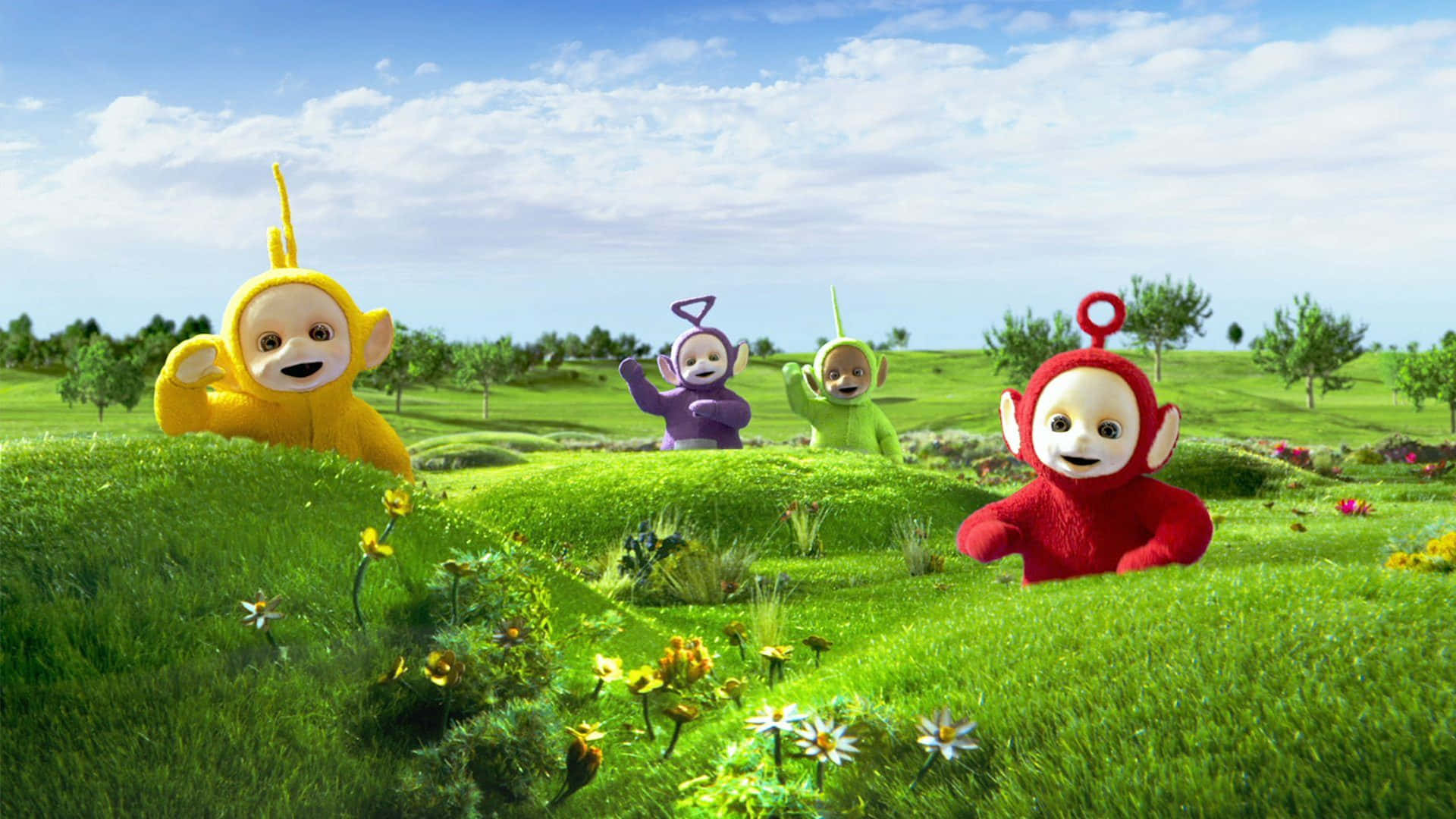 Teletubbies In The Grass