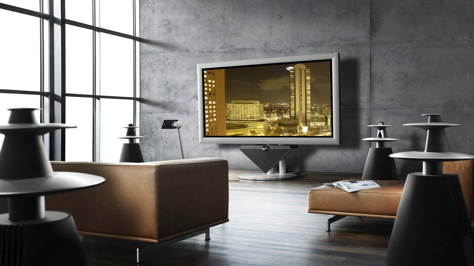 A modern LCD television set in an illuminated room Wallpaper