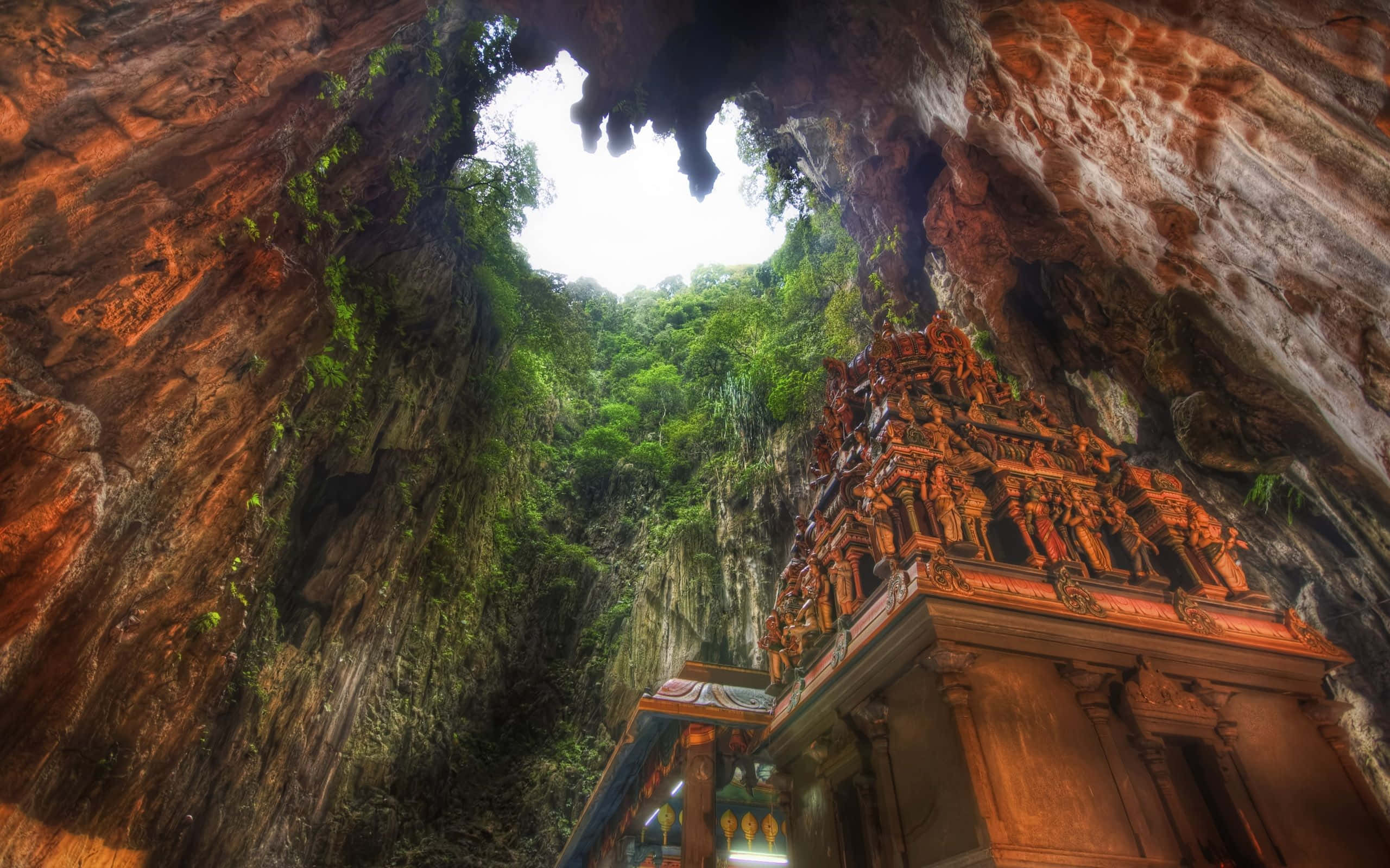 A Cave With A Temple Inside Of It