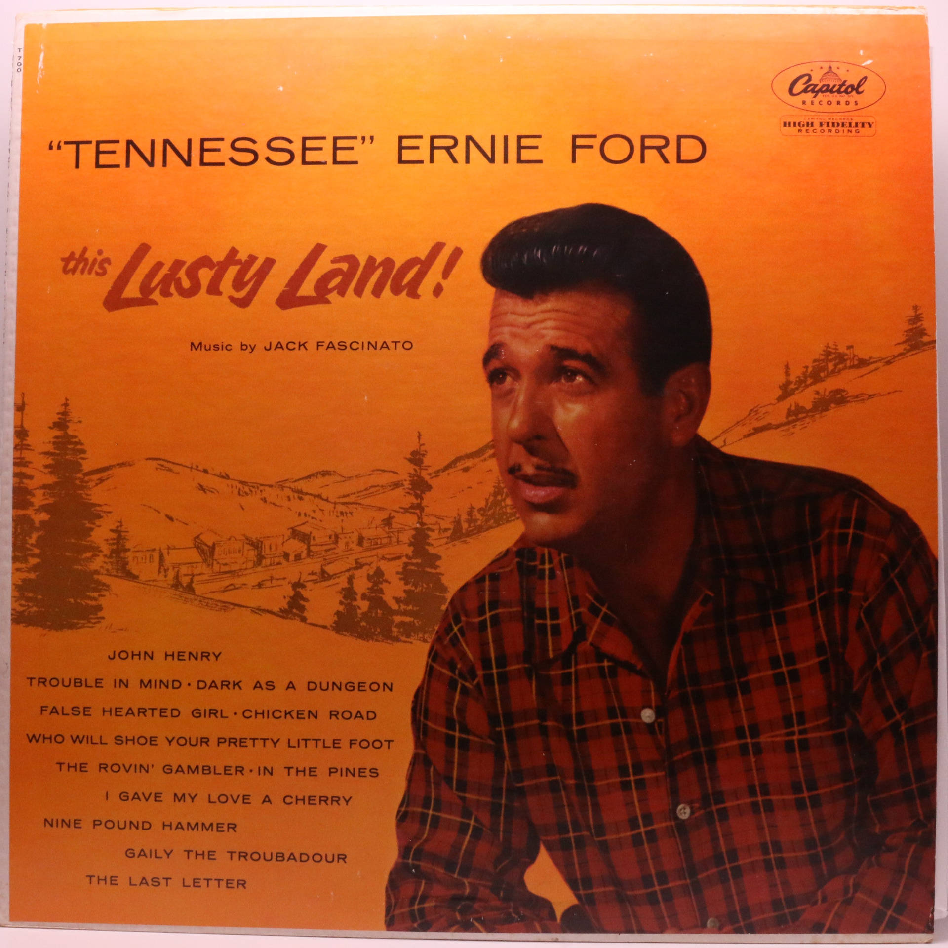 Tennesseeernie Ford För Albumet Lusty Land. Wallpaper