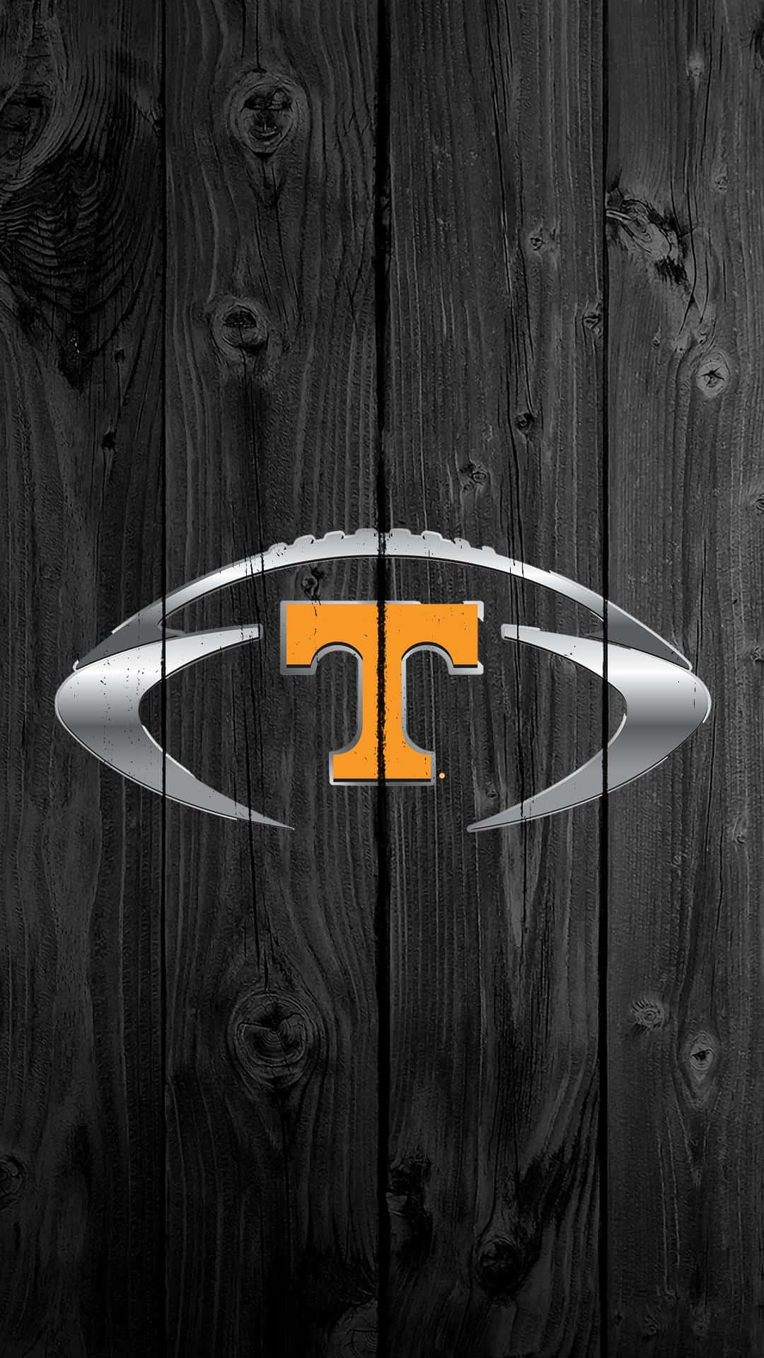 Tennessee Volunteers Logo Tapet: Se LSU Tigers kæmpe mod Tennessee Volunteers på dette energifyldte logo tapet. Wallpaper