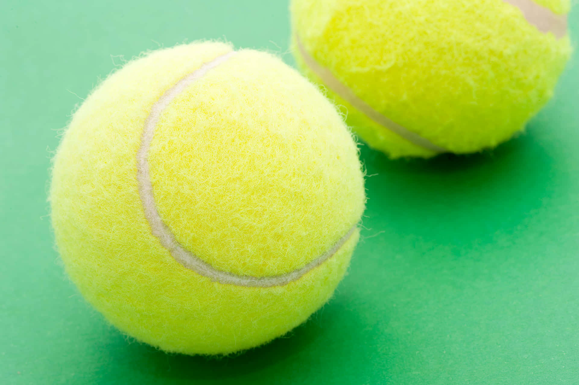 Close-up View Of A Tennis Ball Wallpaper