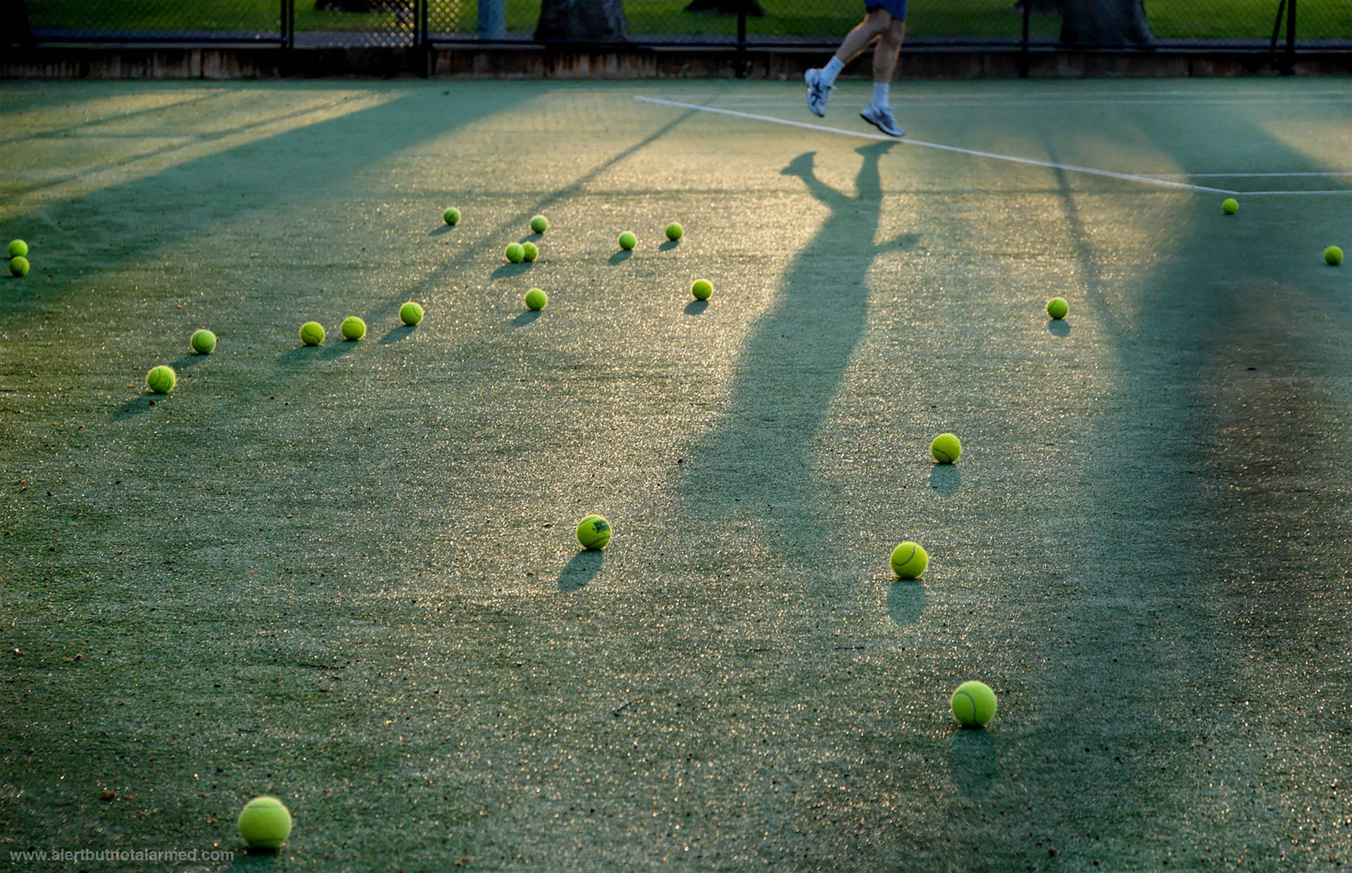 Tennis Balls On Court Wallpaper