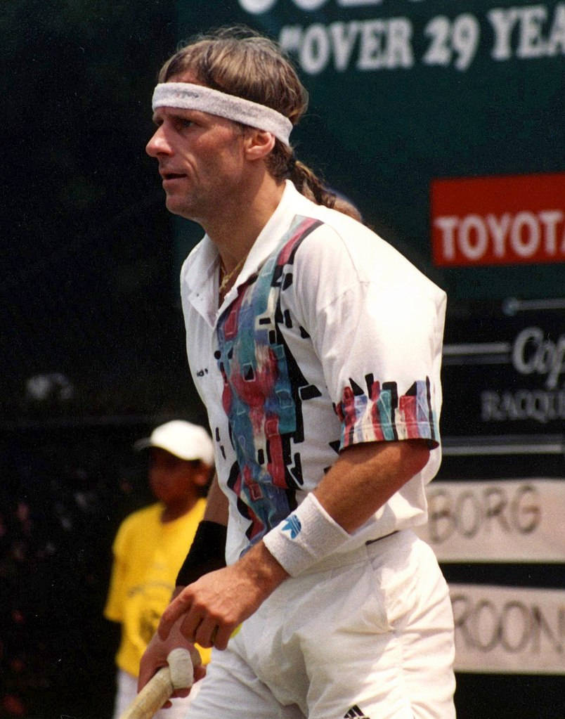 Legendary tennis player Björn Borg in action Wallpaper