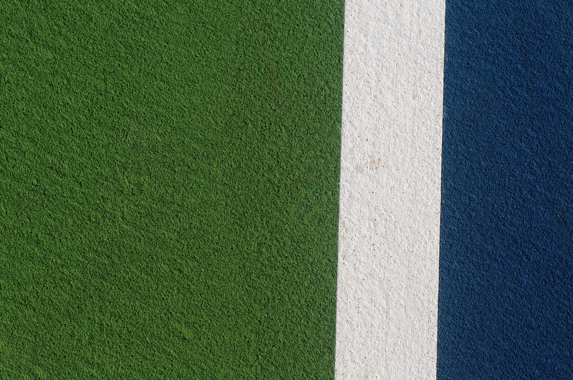 Umcampo De Tênis Com Uma Linha Branca E Azul