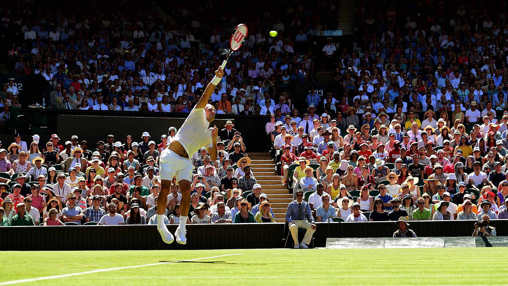 Tennisspelarepå Wimbledon-planen. Wallpaper