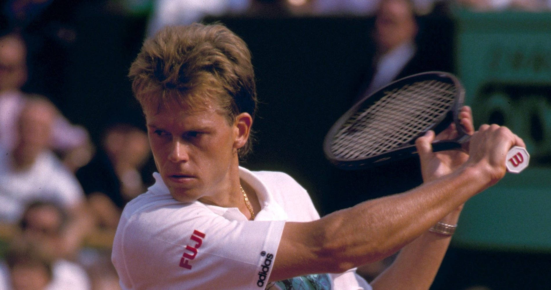Stefan Edberg, the legendary tennis player intensely focused on the court. Wallpaper